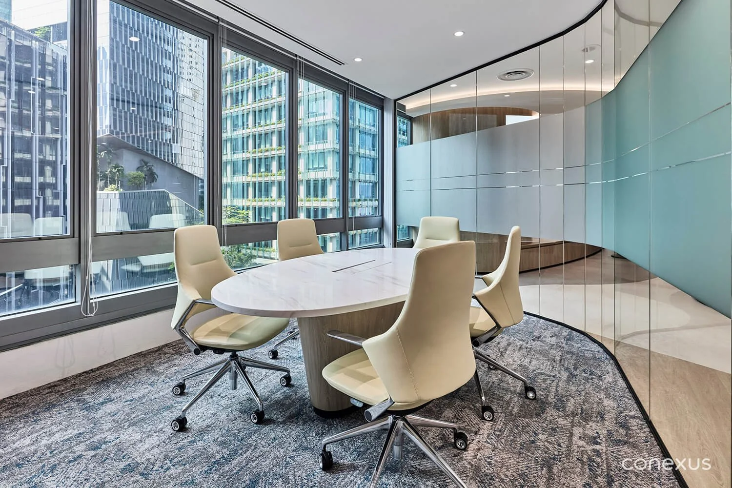  An elegant meeting room, just steps from the entrance, ready to receive guests in style. 