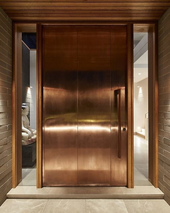 #inspiration , simply gorgeous. 
Entrance made in copper reflecting its original red warmth .
#organic
.
.
.
.
.
.
#lifestylebyaluminr #copperdoor #elevatingartandarchitecture #aluminrworld #aluminrdoors #copperdoors #instainspiration #instadoors #in