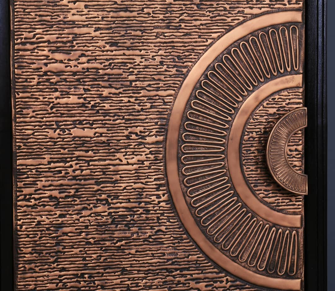 Art of embossing copper is one of the most admirable artisanal techniques used by our artisans. 
Using this we have created our Dine copper door design .
The copper skin is handtextured to desired pattern. 
Our artisans use different inherited tools 