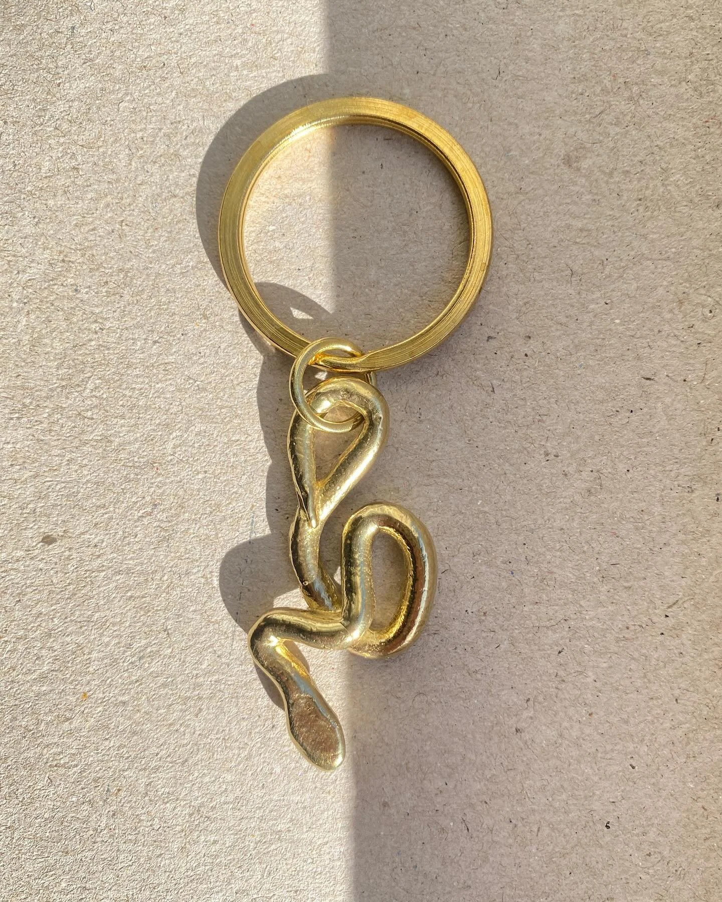 Fresh from the foundry 🔥 
The Snake symbolizes transformation, renewal and wisdom. Associated with both life and death, it represents the concept of rebirth and growth and is understood as a guardian of Knowledge.  #yearofthesnake #brass #keyring