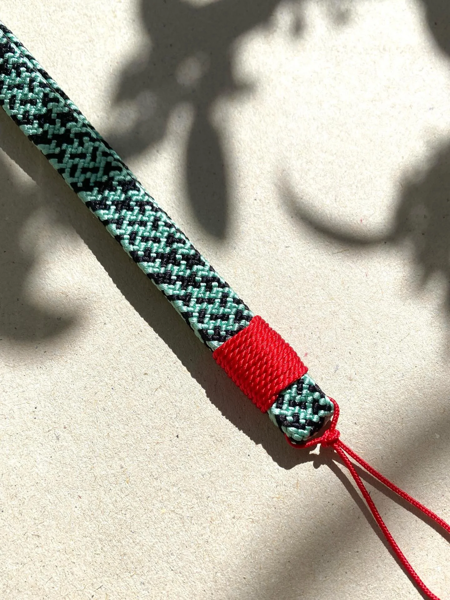 MUSUBI TIE ✨ 

Musubi is the Japanese word for &bdquo;knot&ldquo; or &bdquo;tying&ldquo;. Simbolically, it represents connections, relationships and bringing things together. Attach it to your phone, AirPod case, key chain, or make a gift to a friend