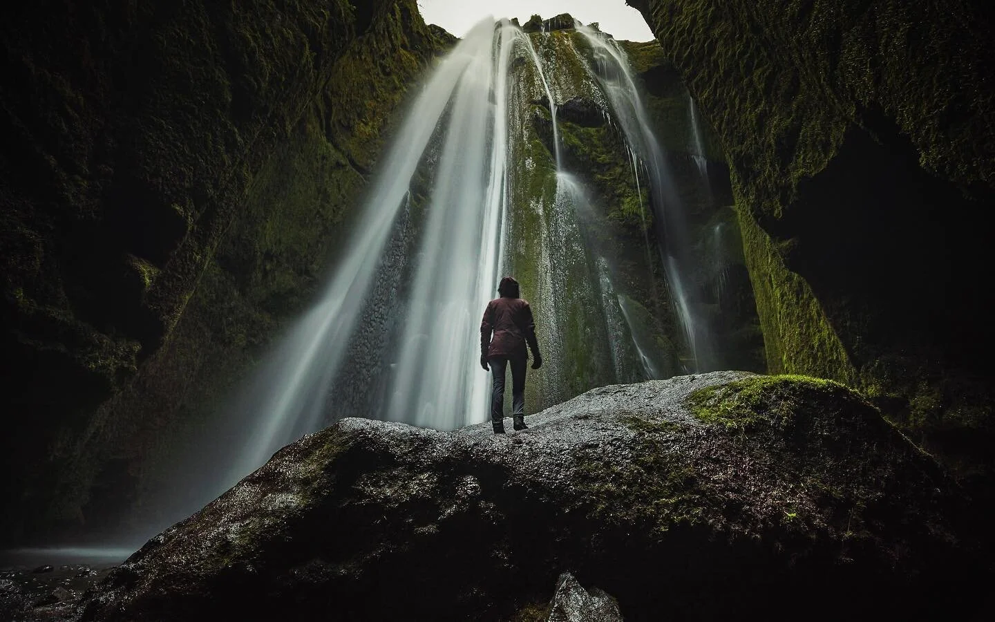Take a walk down the path from the ever popular Seljalandsfoss, and you too can get soaked, standing completely still for 2 seconds while trying not to get blown off a boulder. @emazing.journey nailed it. This is Gljufurarfoss. It&rsquo;s loud, it&rs