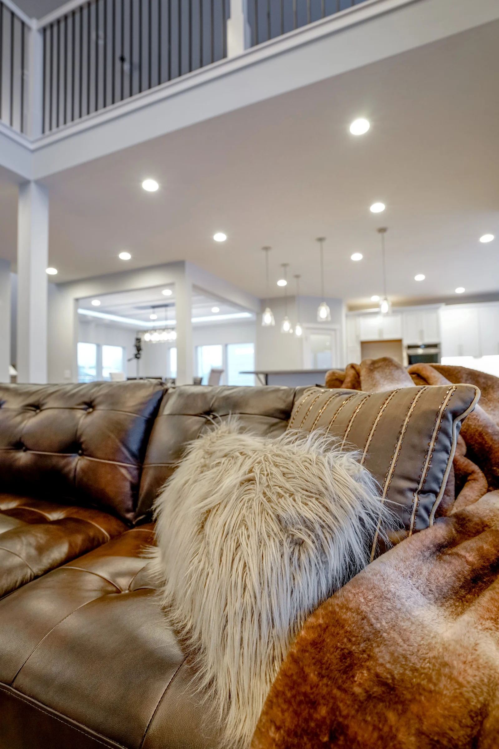 Living room with leather couch in custom built Washington house