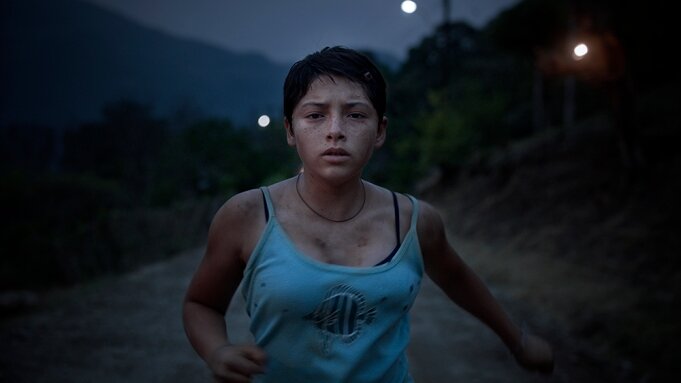  September 30, 2021  IndieWire: NYFF:  Review of  Prayers for the Stolen   (Tatiana Huezo, 2021)    Tatiana Huezo offers up a murky, mesmerizing look at what it feels like for young women to come of age in a town where they have targets on their back