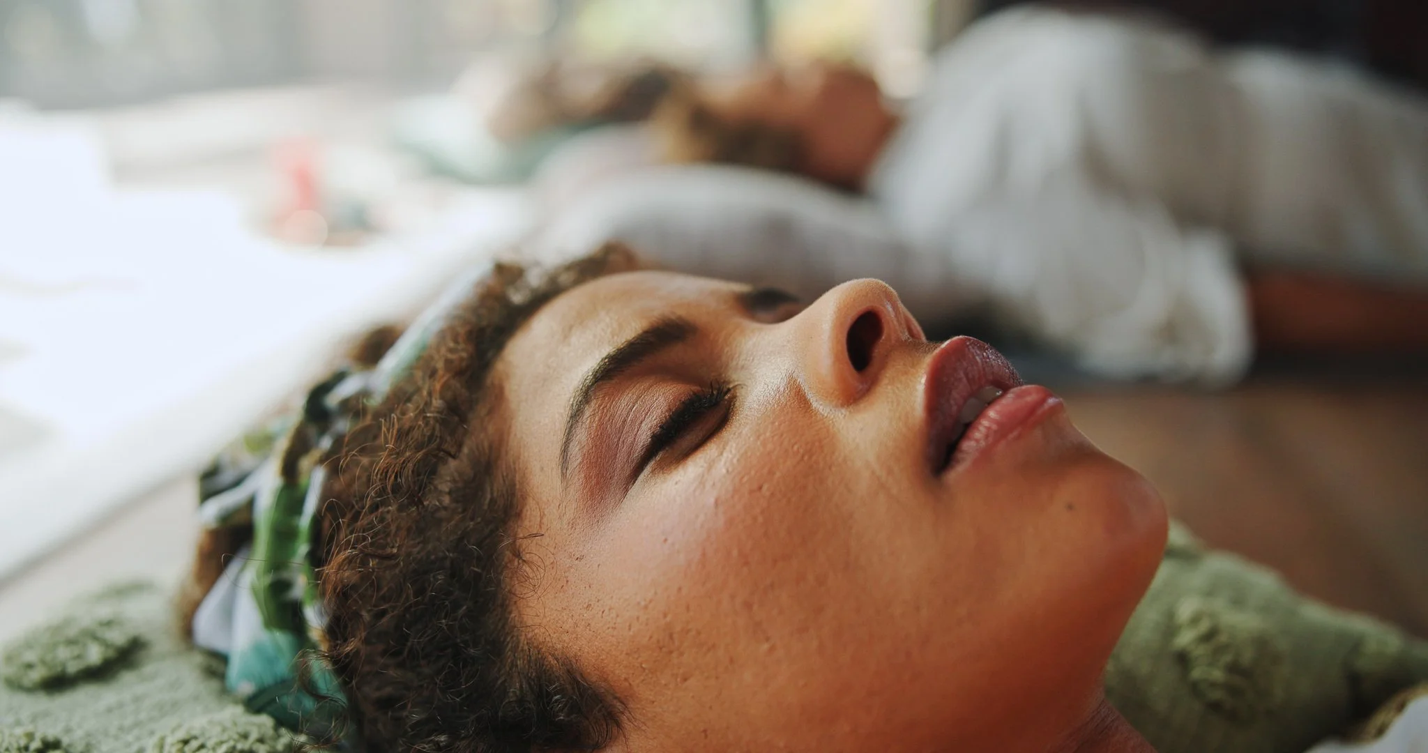 Person laying down with their eyes closed
