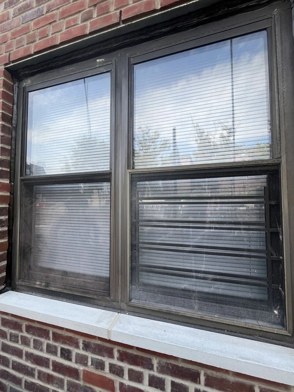 Upclose brick and window facade repairs by Rojas AP.jpeg
