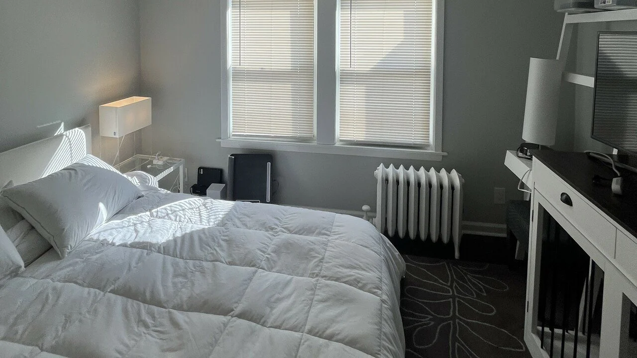 Bedroom space as part of a two family renovation by Rojas AP.jpeg