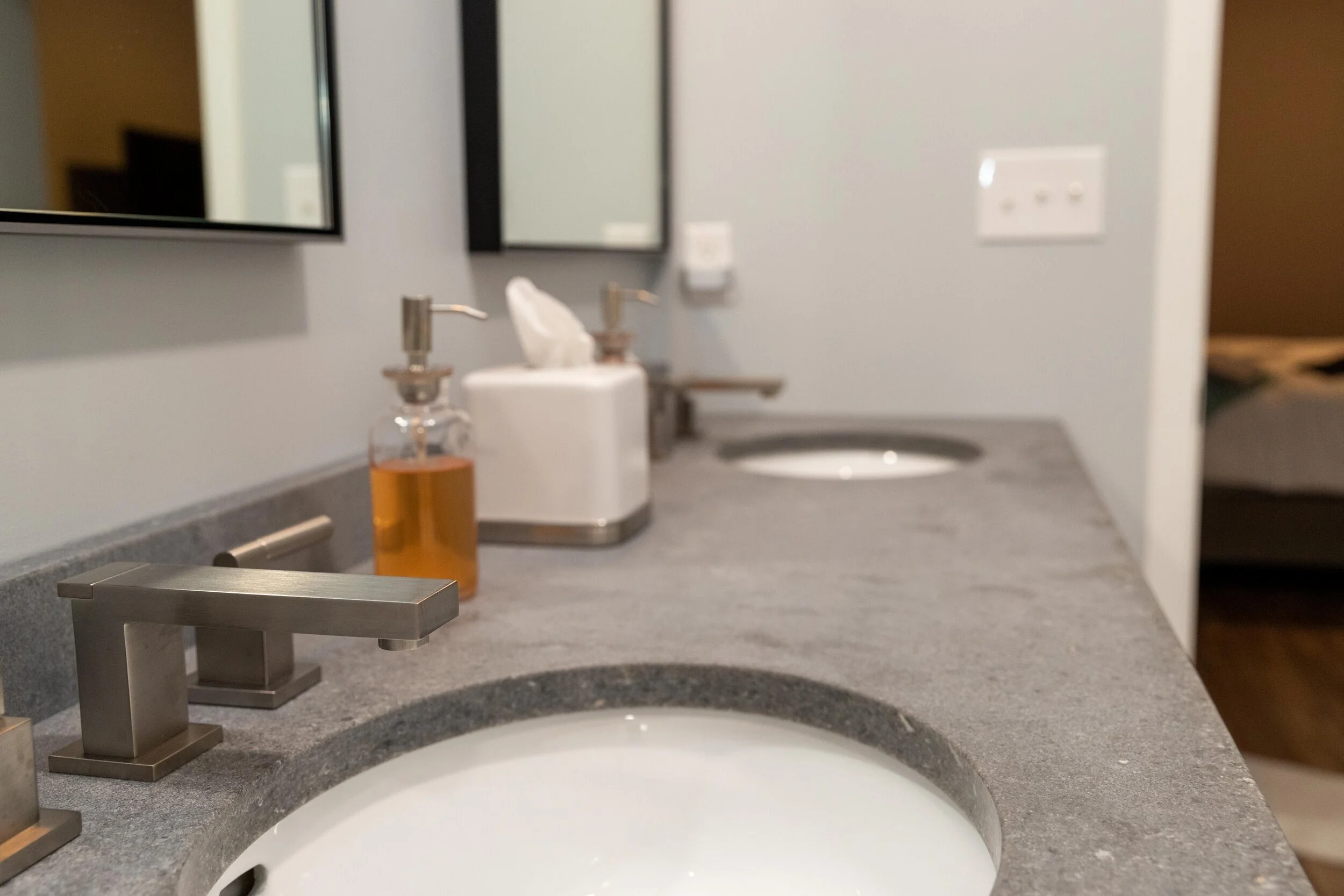 Distressed concrete counter top on double vanity