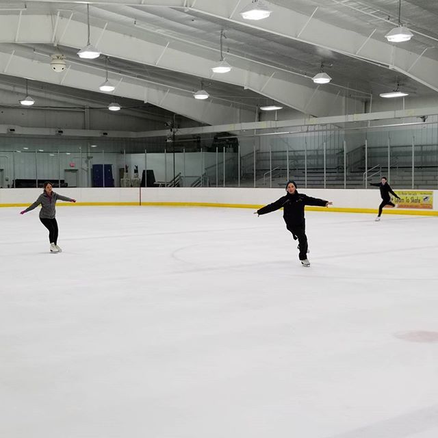 Coach Sara teaching the SHU skater their dances