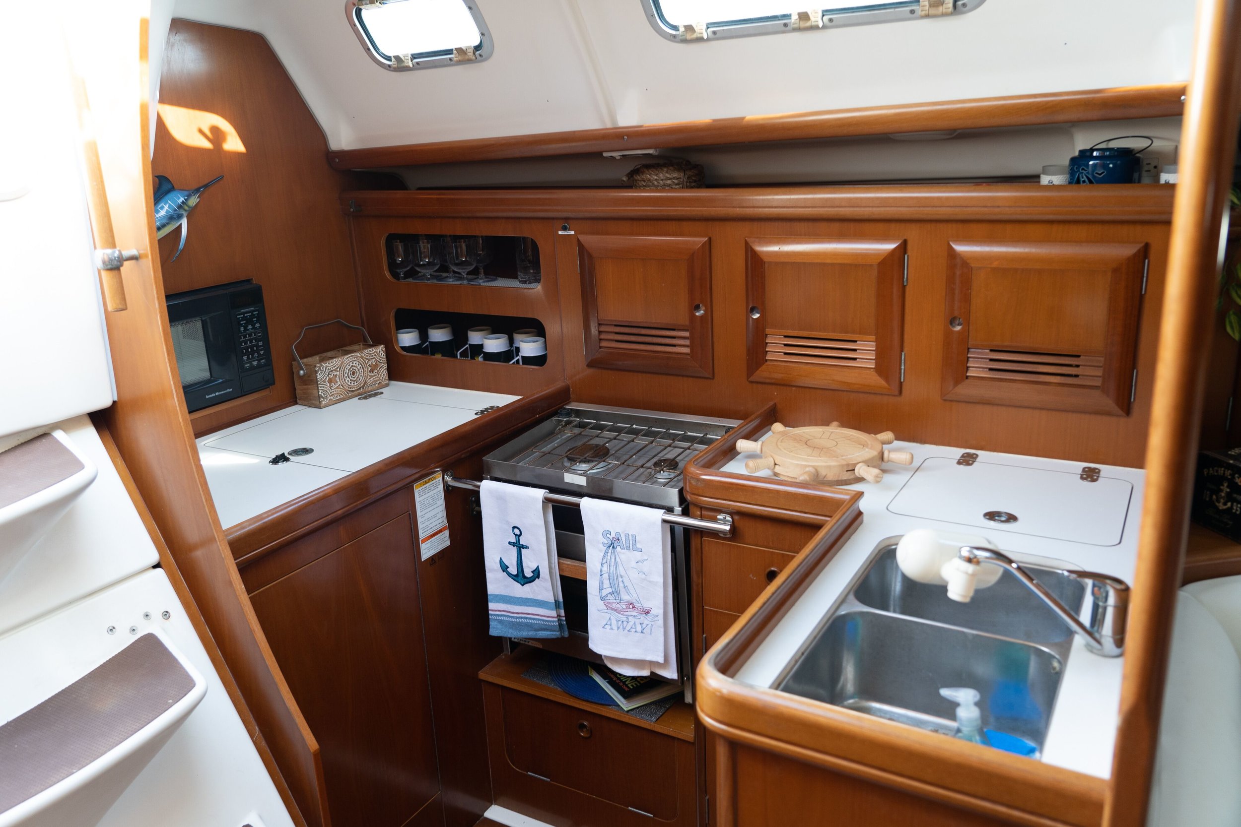 Hawaii Sail Charters Kona Sailing & Snorkeling Tours Big Island Private Sailing Charters-16 Guest in The Galley Kitchen.jpg
