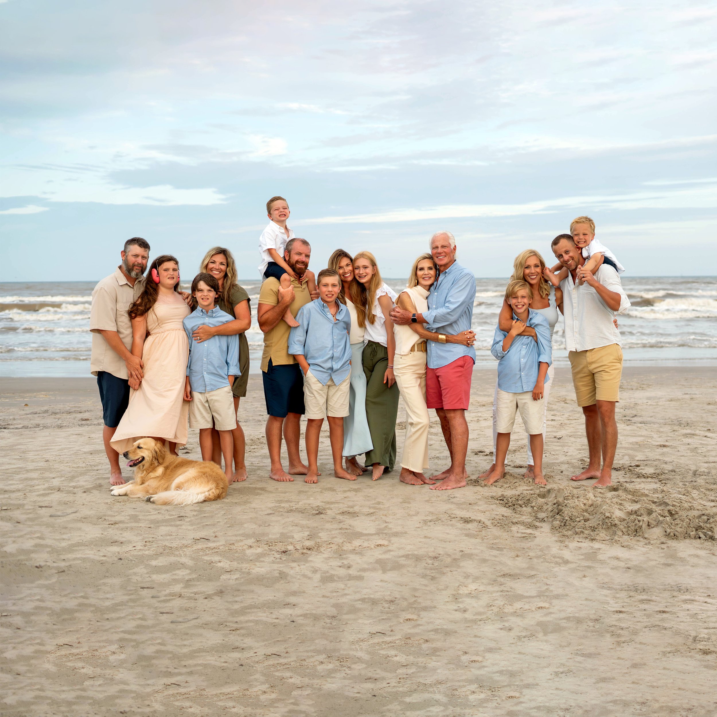 Port Aransas beach photographer extended family hugging on beach
