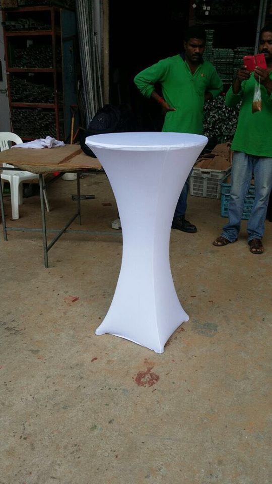 Cocktail table w/ white stretch cover