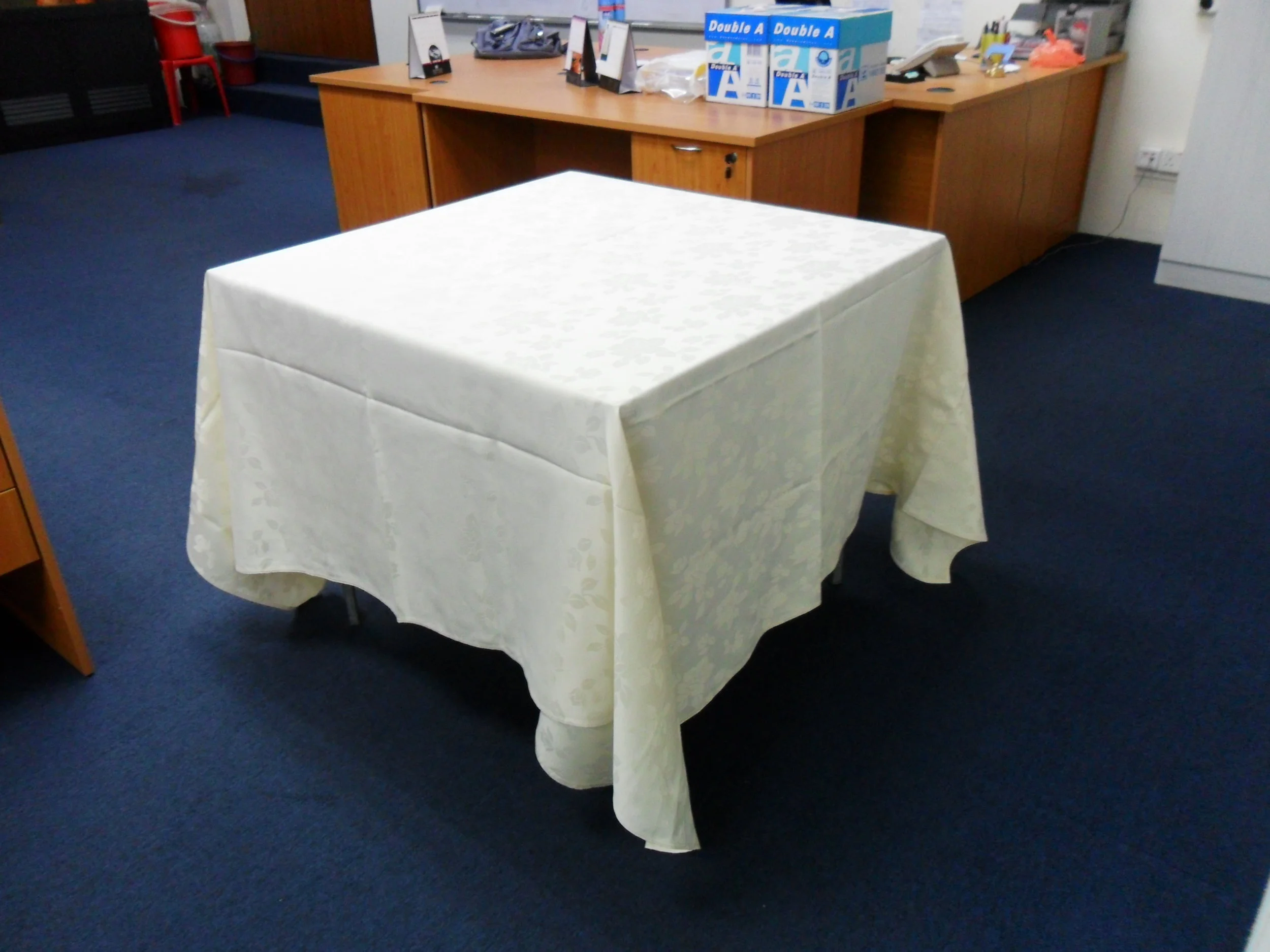 3x3' table w/ ivory table cloth