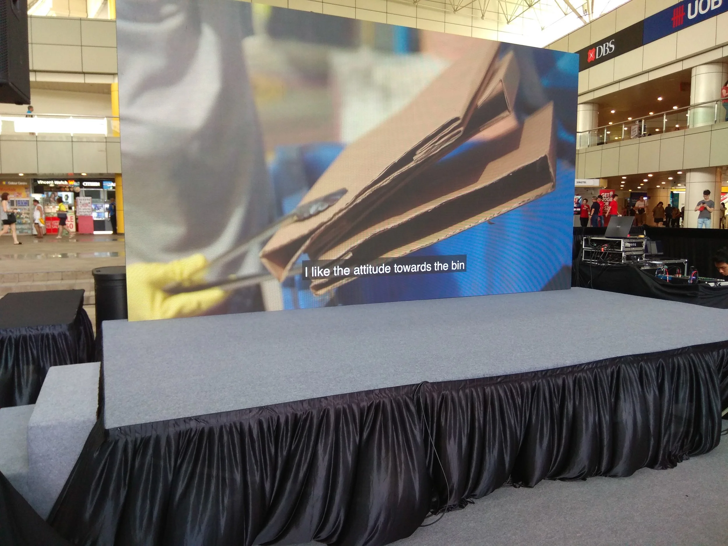 Carpeted stage w/ LED wall backdrop
