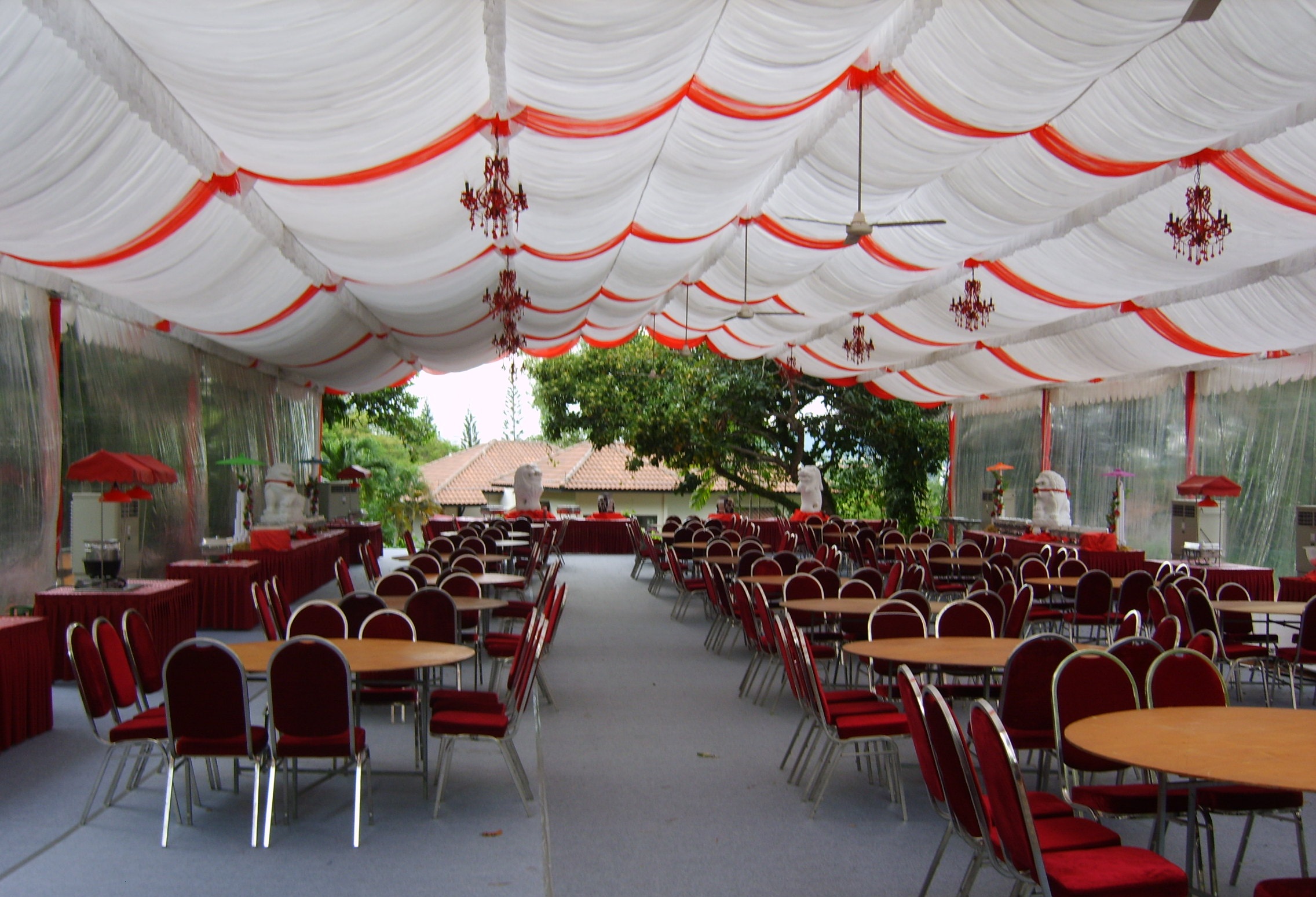 bare round table with red cushion chairs.JPG