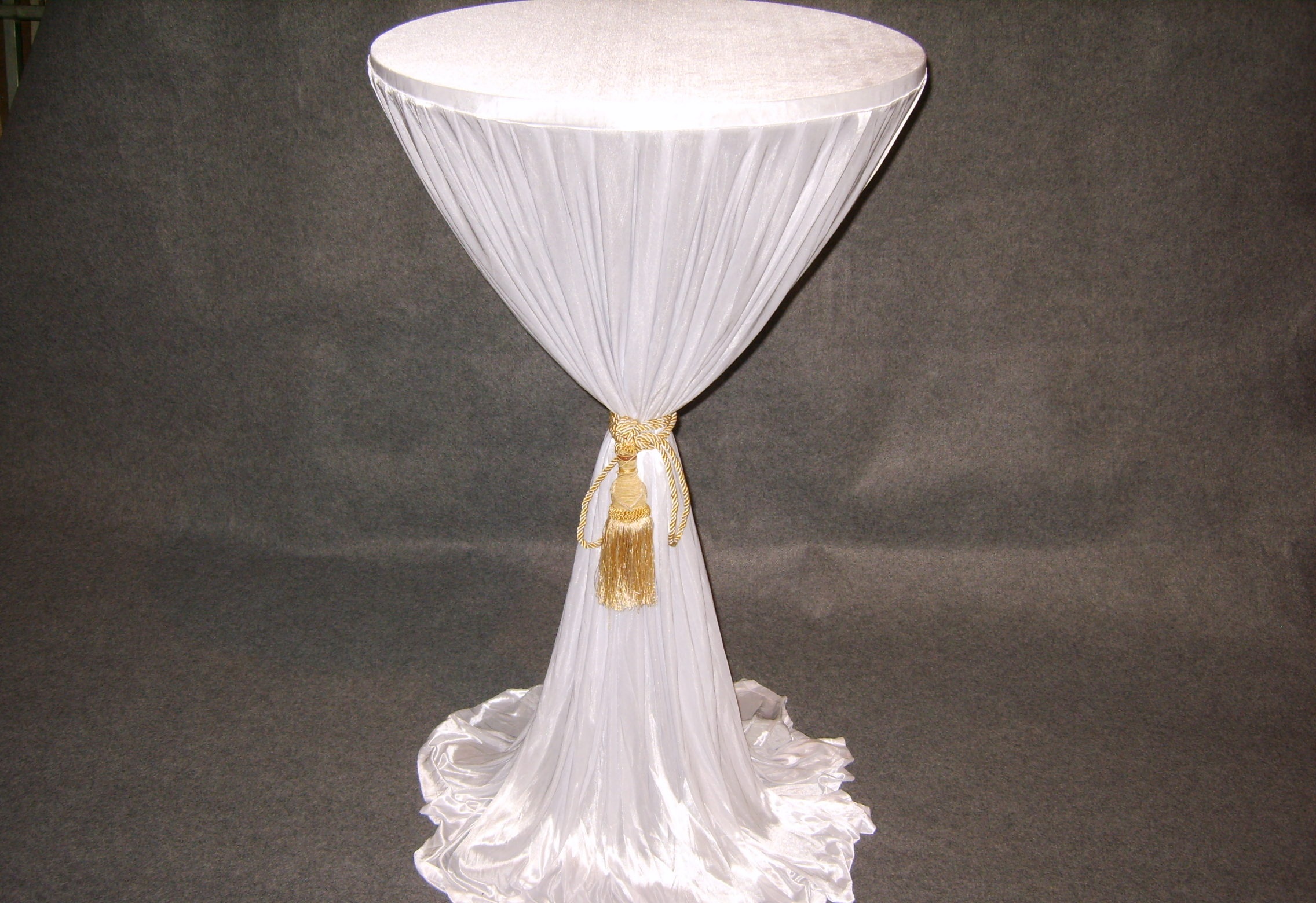 Cocktail table w/ white cover