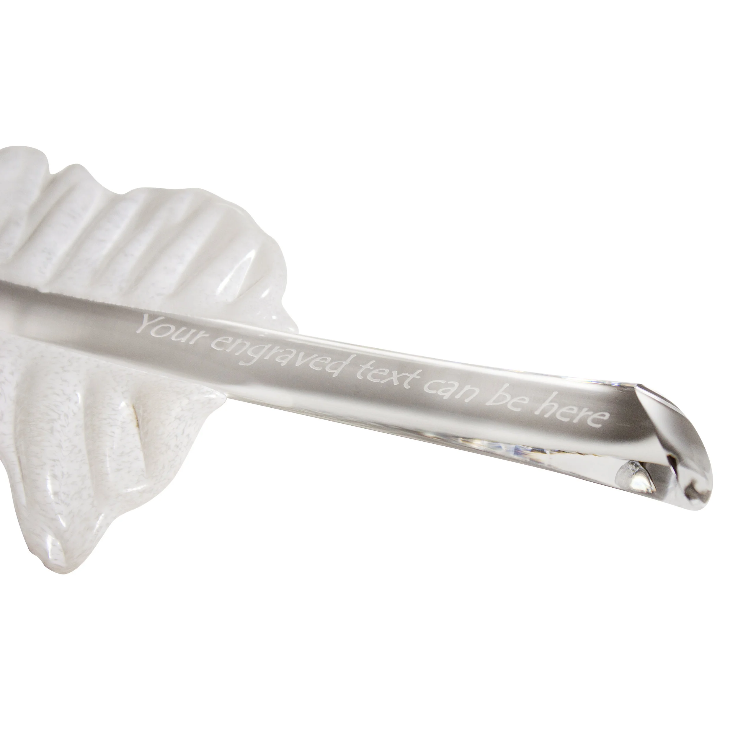 white feather with engraving