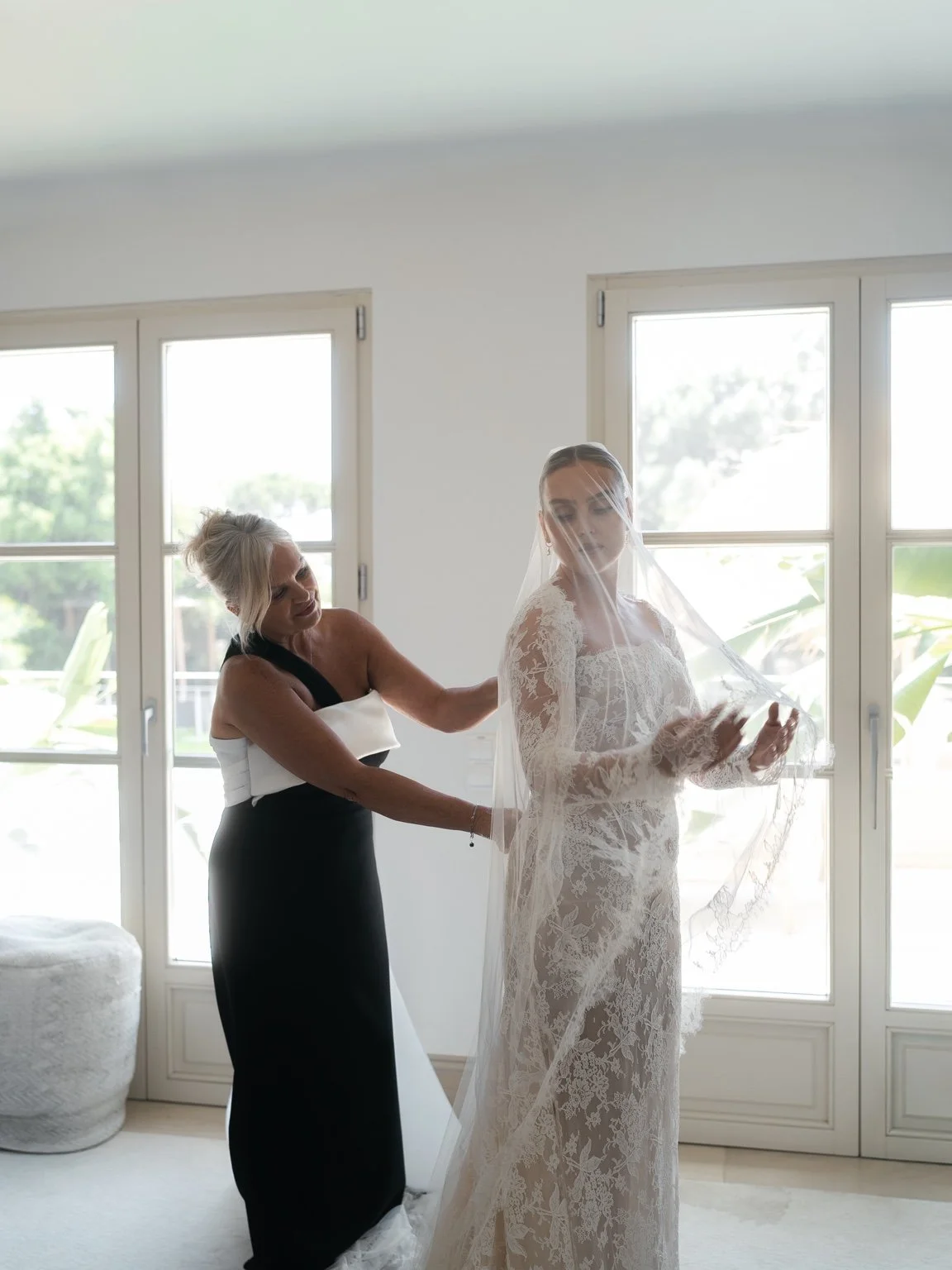 Perrie during her wedding preparations by a window
