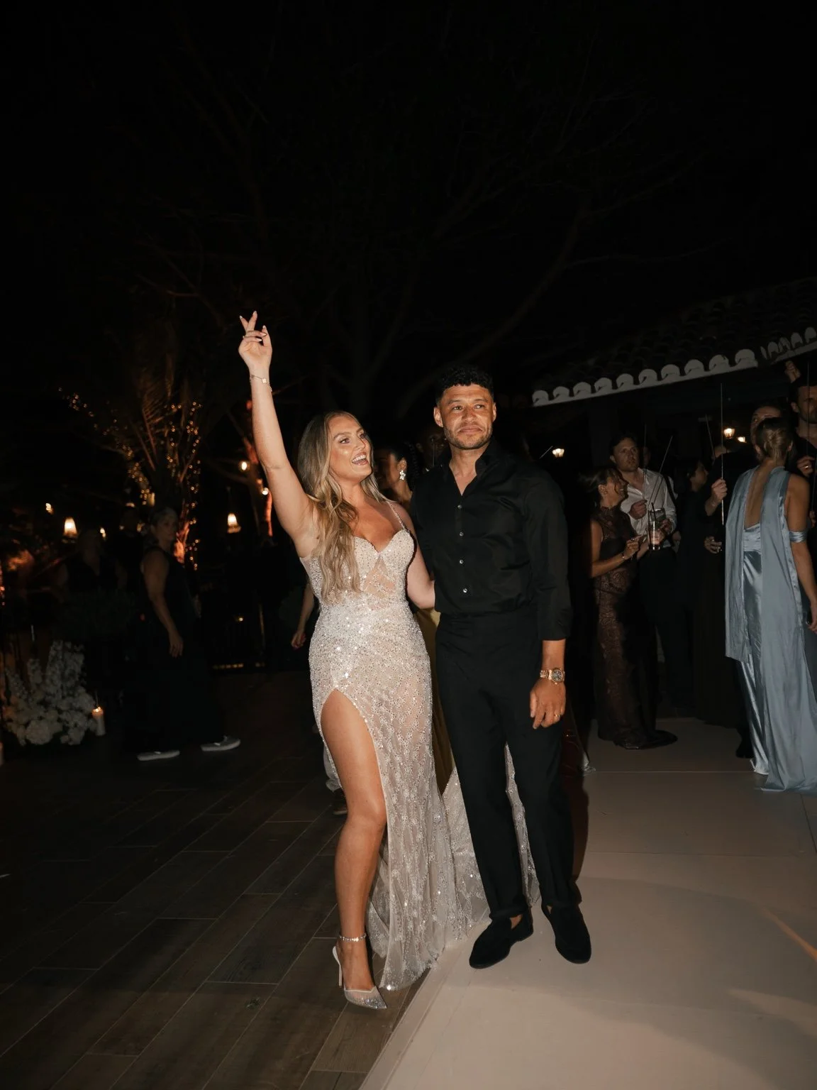 Perrie and Alex celebrating at the evening party