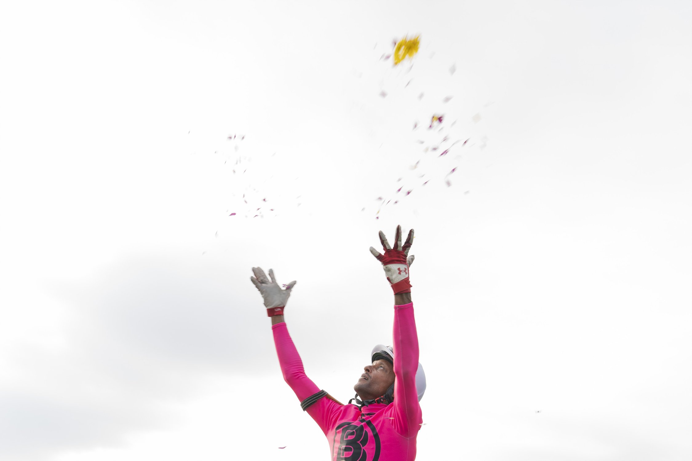 Jokey Patrick Husbands throws flowers into the air after  claiming the 164th running of the Kings’s Plate horse race in Toronto on Sunday, August 20, 2023. THE CANADIAN PRESS/Spencer Colby 