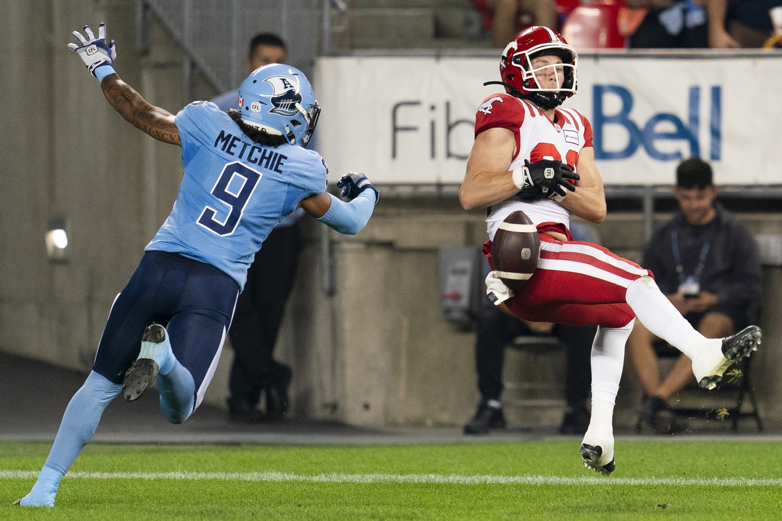  Calgary Stampeders wide receiver Cole Tucker (88) misses a touchdown catch as Toronto Argonauts defensive back Royce Metchie (9) works the defence during first half CFL football action in Toronto, on Friday, Aug. 25, 2023. THE CANADIAN PRESS/Spencer