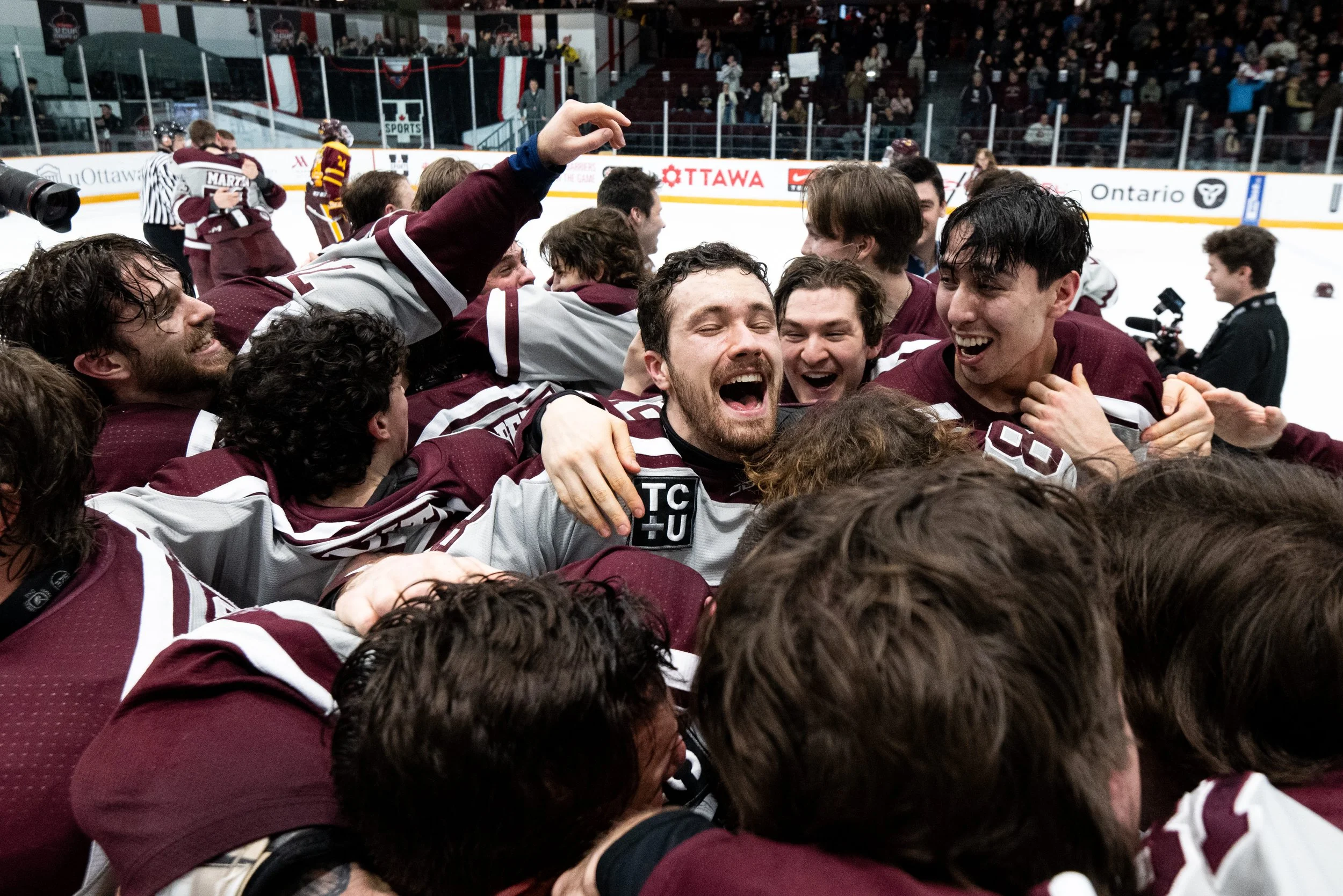  University of Ottawa forward Charles-Antoine Roy (28) celebrates with teammates after defeating Concordia University following third period U Sports University Cup Men's Hockey Championship gold medal action in Ottawa, on Sunday, March 23, 2025. Uni