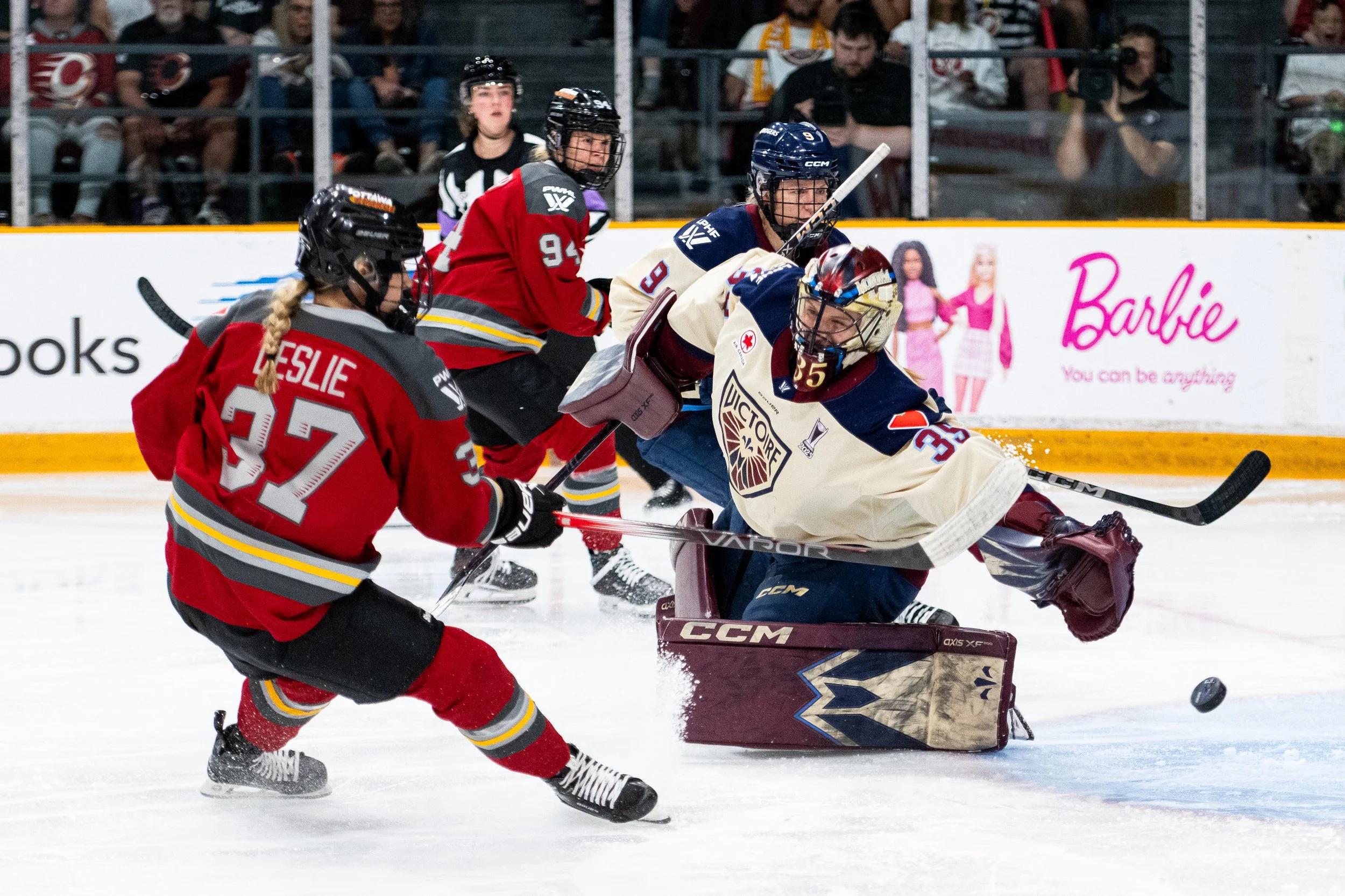  Ottawa Charge's Rebecca Leslie (37) scores on Montreal Victoire goaltender Ann-Renee Desbiens (35) during first period PWHL playoff hockey action in Ottawa, on Friday, May 16, 2025. THE CANADIAN PRESS/Spencer Colby 