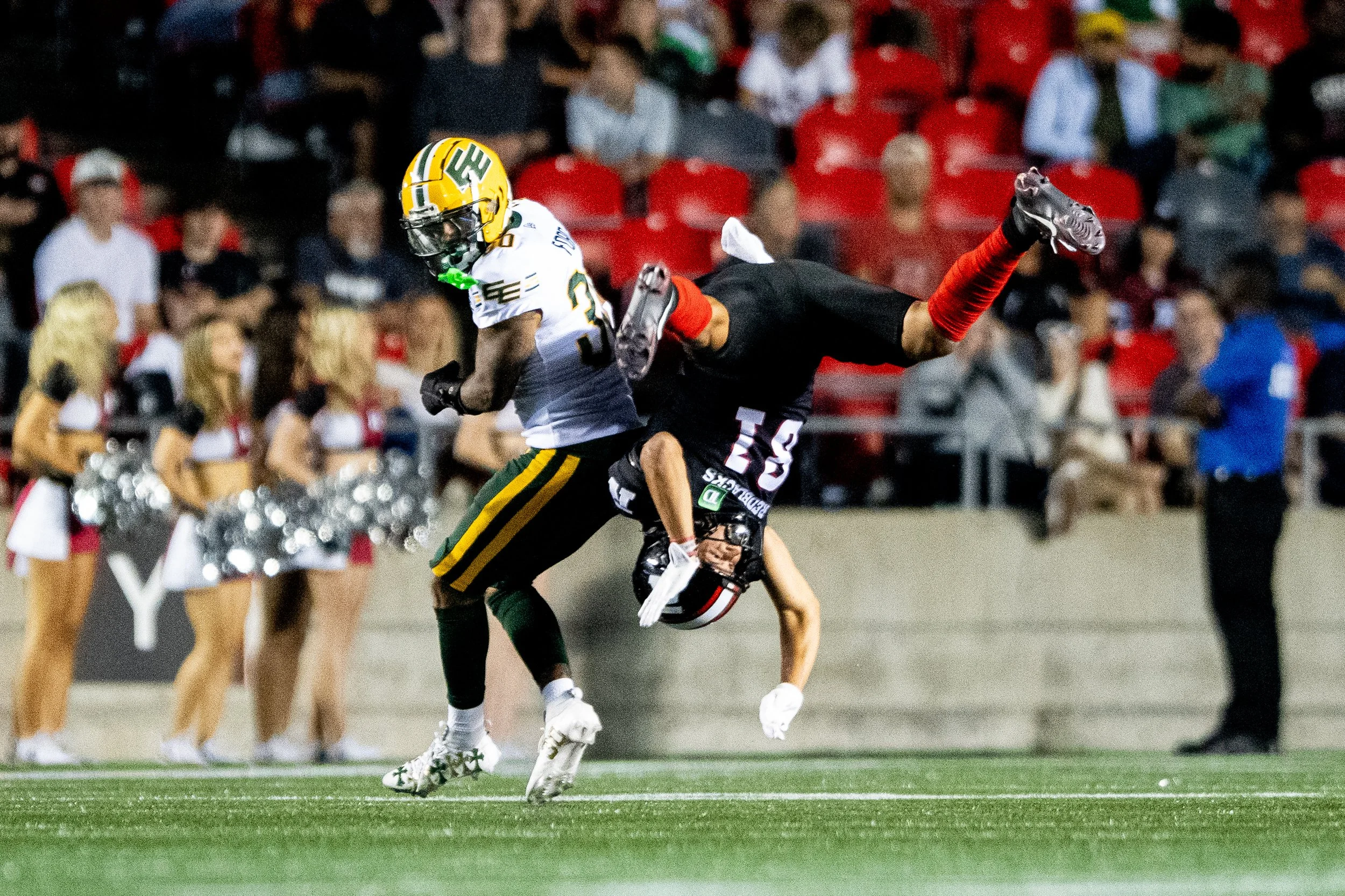  Ottawa Redblacks wide receiver Keelan White (81) is tackled by Edmonton Elks defensive back Tyrell Ford (30) during second half of CFL action in Ottawa, on Friday, Aug. 22, 2025. THE CANADIAN PRESS/Spencer Colby 