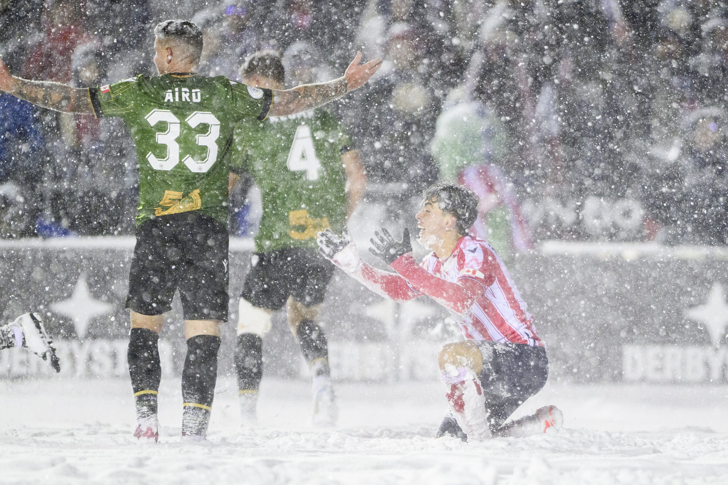  Atletico Ottawa's David Rodríguez (7) lays in the snow as he reacts to a referees, not pictured, call during second half Canadian Premier League finals soccer action in Ottawa, on Sunday, Nov. 9, 2025. THE CANADIAN PRESS/Spencer Colby 