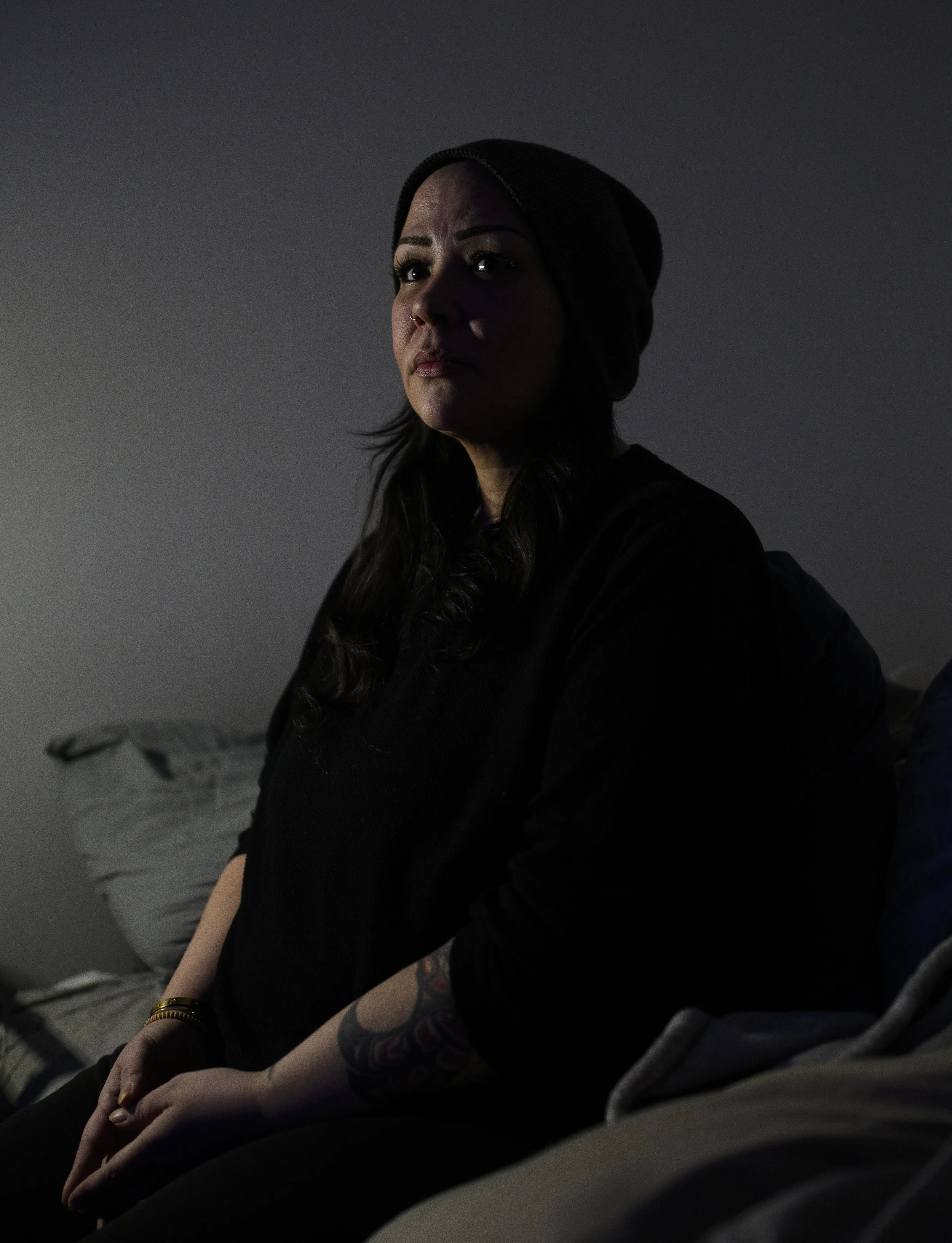  Amanda Godda poses for a picture in her home in Ottawa, on Tuesday, Dec. 16, 2025. Godda, 42, suffers from chronic pain and has been bedridden since August 2025. THE CANADIAN PRESS/Spencer Colby 