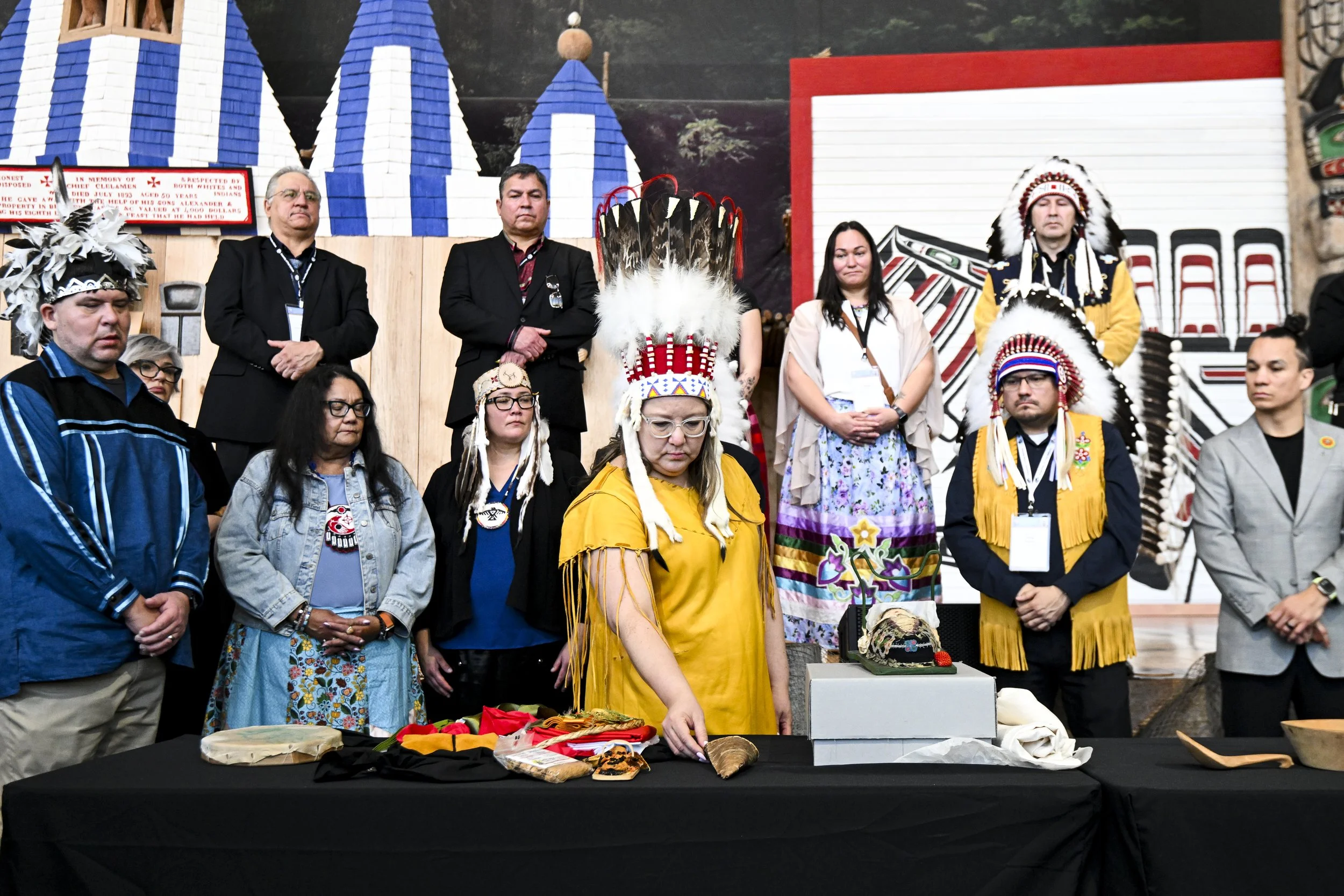  Assembly of First Nations Chief Cindy Woodhouse Nepinak touches a sacred item as its unveiled following their return from Vatican collection during an unveiling event at the Canadian Museum of History in Gatineau, Que., on Tuesday, March 10, 2026. T