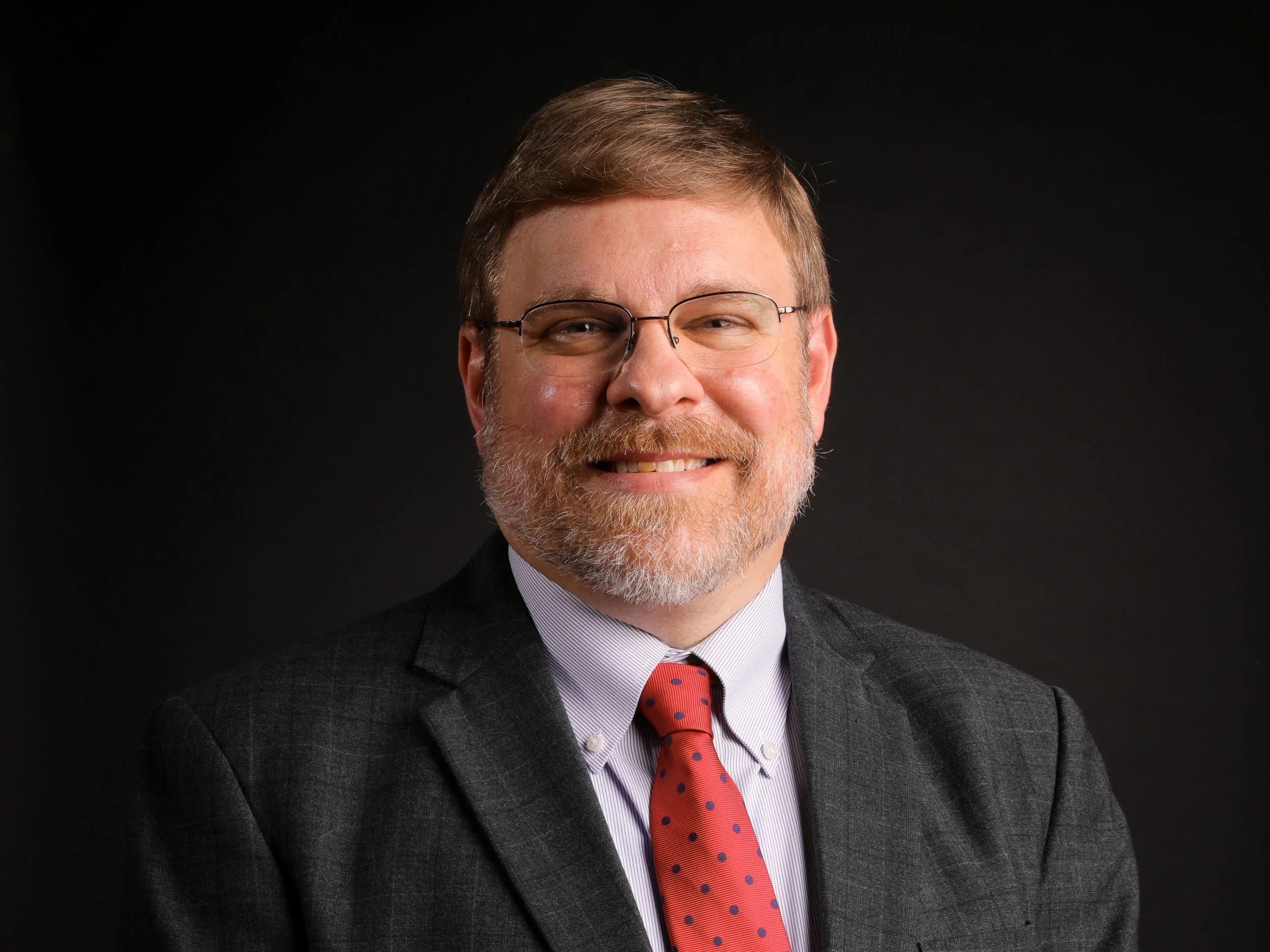 Photo of Brett Loney, newly named President of Adopt America Network