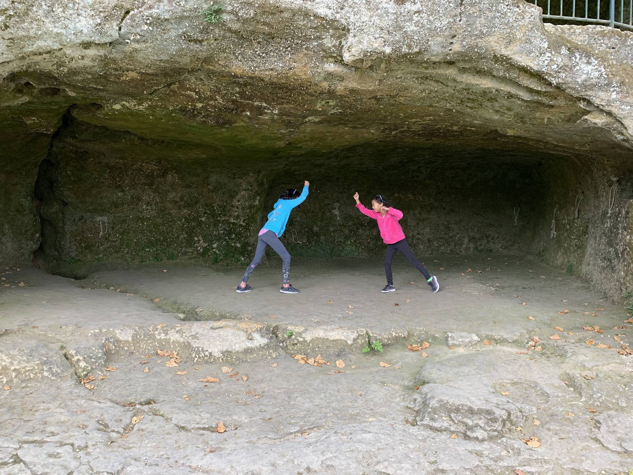 Cave women fighting.