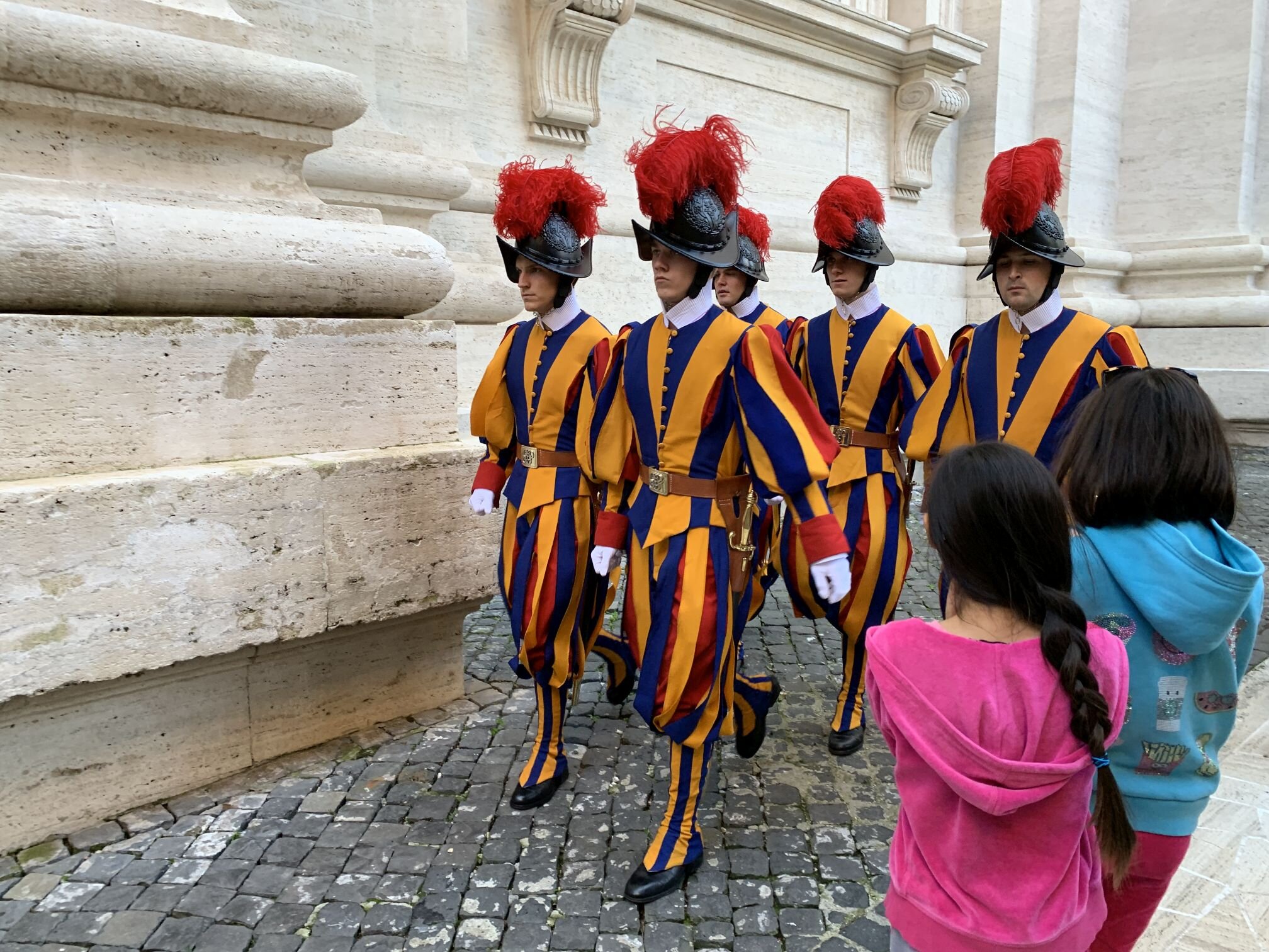 Pontifical Swiss Guards protect the Pope and the Apostolic Palace.