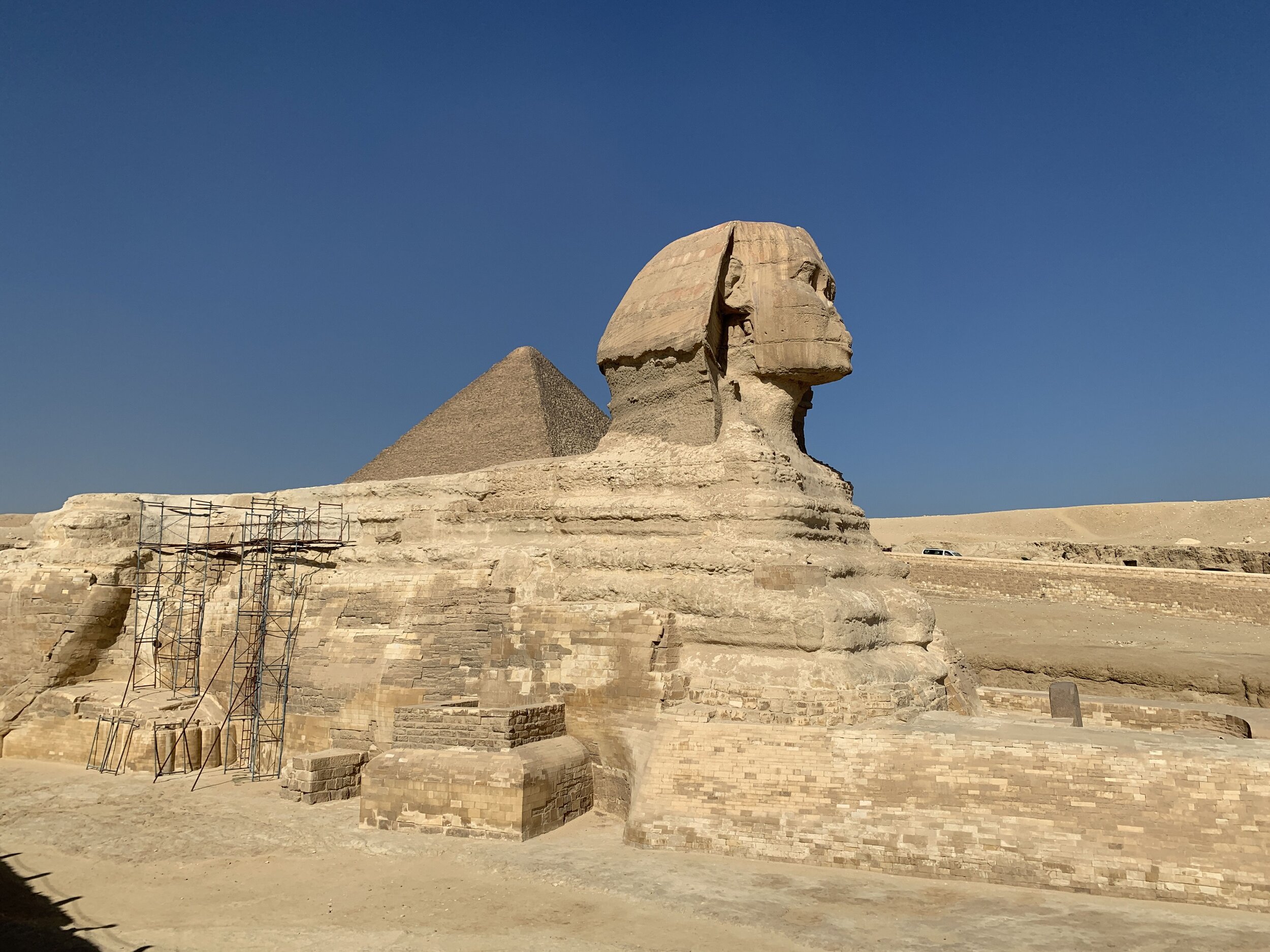 The Great Sphinx, carved out of one single rock, is meant to protect the Great Pyramid.