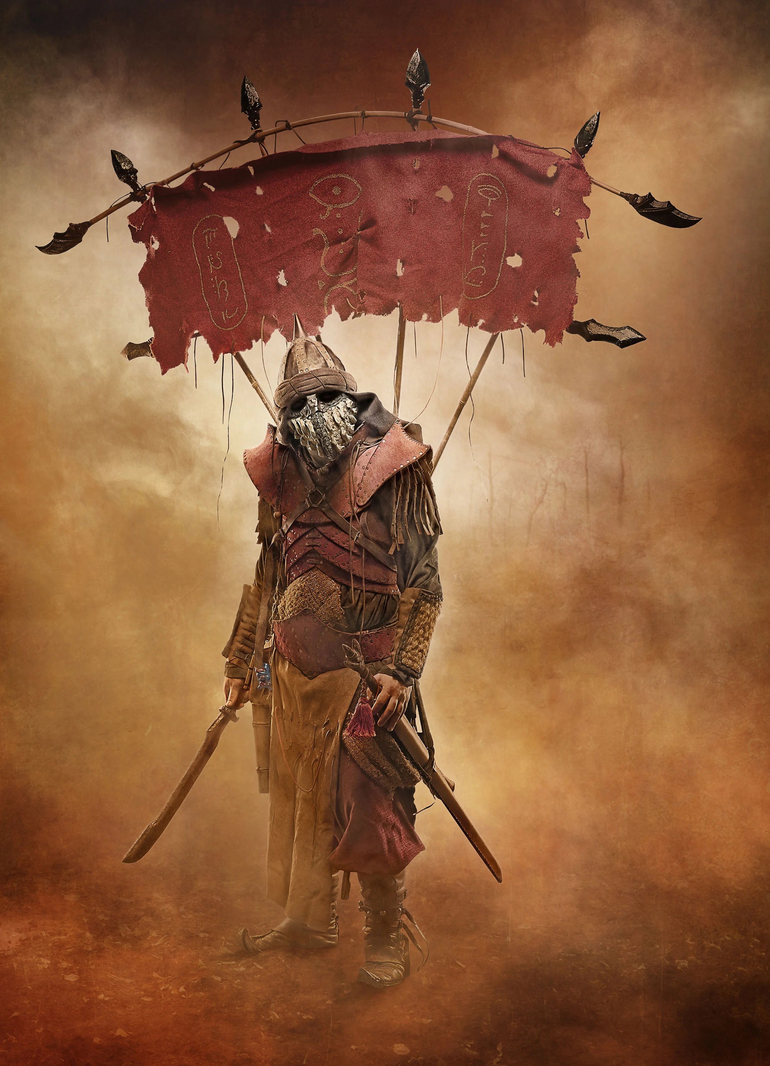 A character dressed as a zombie warrior wearing a skull mask and medieval armor, holding a staff, with a tattered red banner with gold symbols and spikes, set against a foggy, autumnal background.