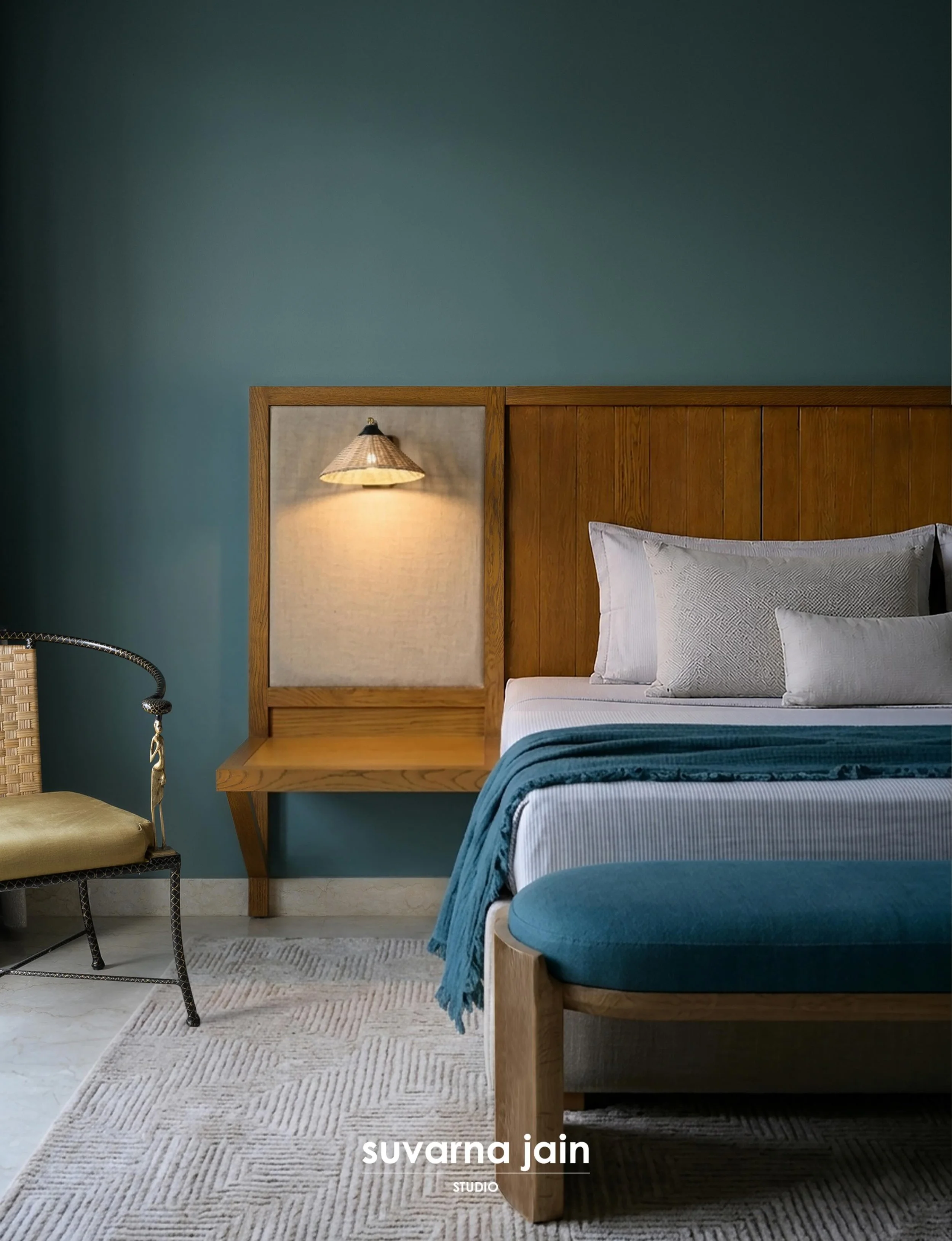 nostalgic home; the guest bedroom was envisioned as a quiet retreat- calm, grounded and soft. 
bold teal walls set a gentle backdrop against warm oak detailing, tactile linens and layered textures, creating a space that feels intimate, comforting and