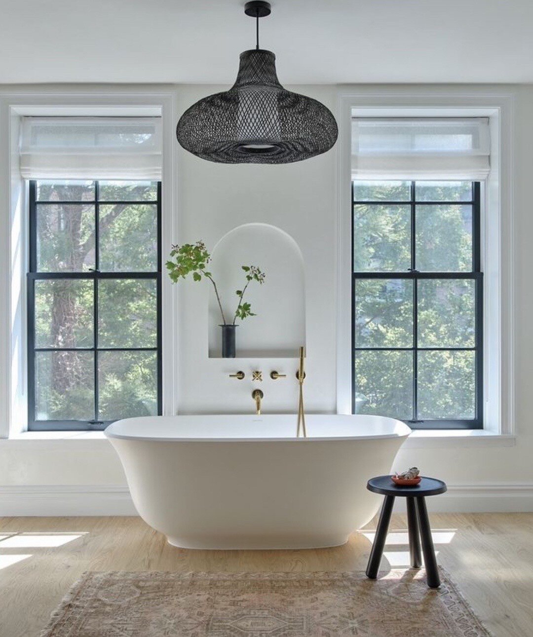 Imagine yourself stepping into this airy space for R&amp;R. This contemporary bathroom features luxury brass faucets available at Cesario &amp; Co.

Looking for expert advice on fixtures and finishes for an upcoming project? Get in touch at the link 