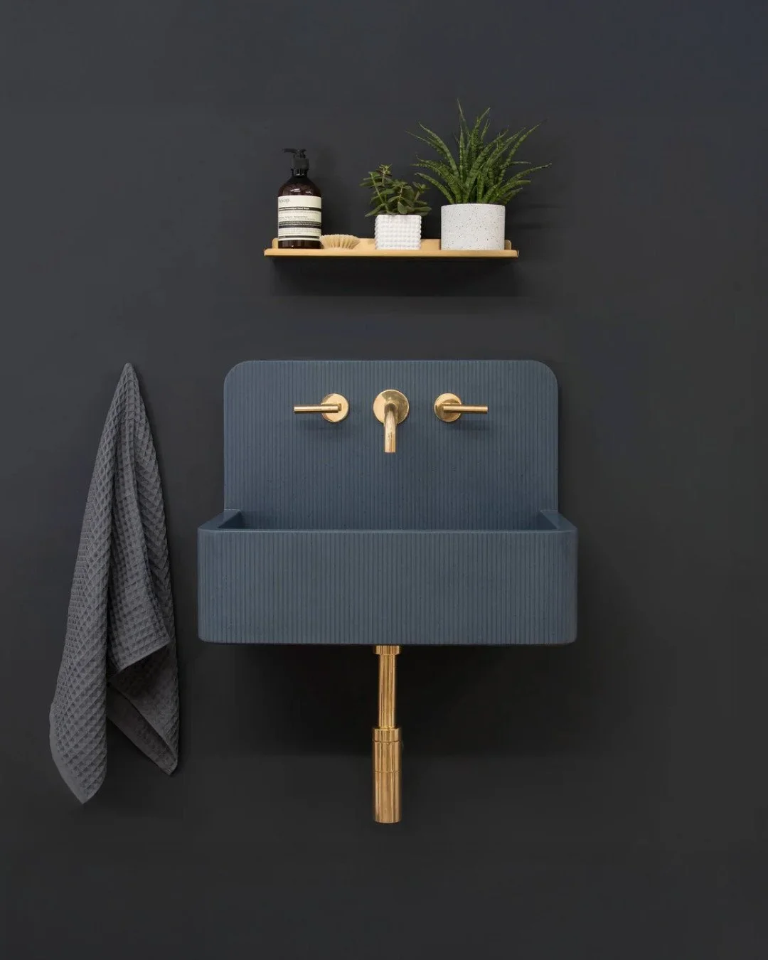 Finishes that feel moody, rich in tones, and sculptural forms speak for themselves.⁠
⁠
These fluted concrete sinks bring texture and depth like no others.⁠
⁠
Discover more in our showroom. Link in our bio. ⁠
⁠
&bull;⁠
⁠
#interiordesign #worldofinteri
