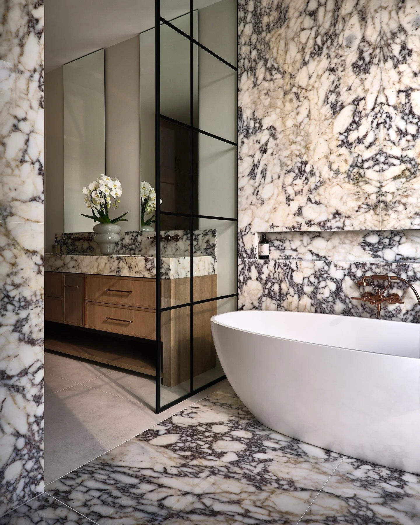 A closer look inside the Primary Ensuite at Project Sideroad, where distinctive copper finishes draw the eye and highlight the details that bring the space together.

Faucets sourced from Cesario &amp; Co.
Project: @contempo_studios