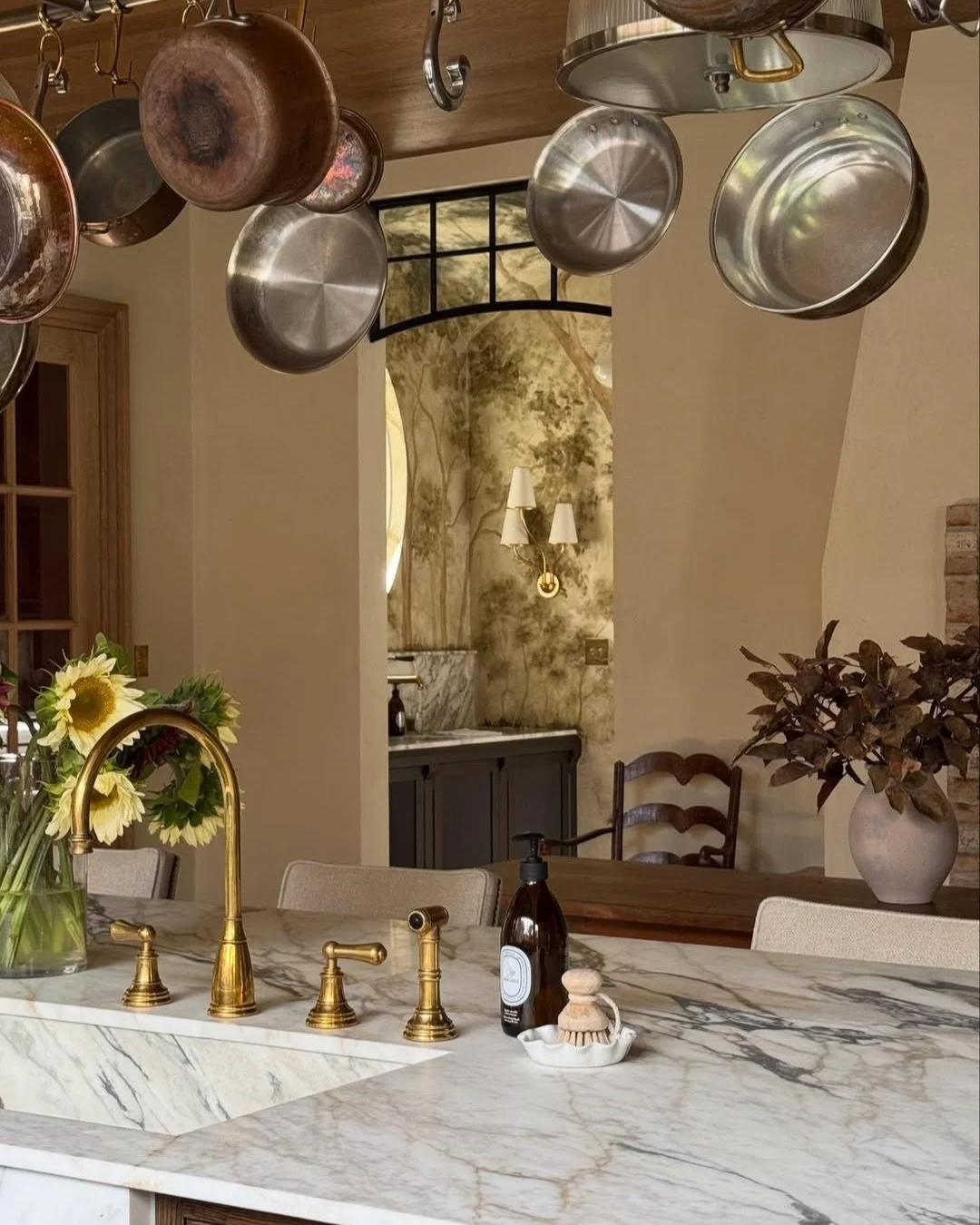 The faucet that quietly steals the show. ✨

Perfectly finished in aged brass and crafted to stand out &mdash; anchoring the space with a sculptural touch to a kitchen rooted in warmth and transition,

We&rsquo;re here to help you source the perfect f