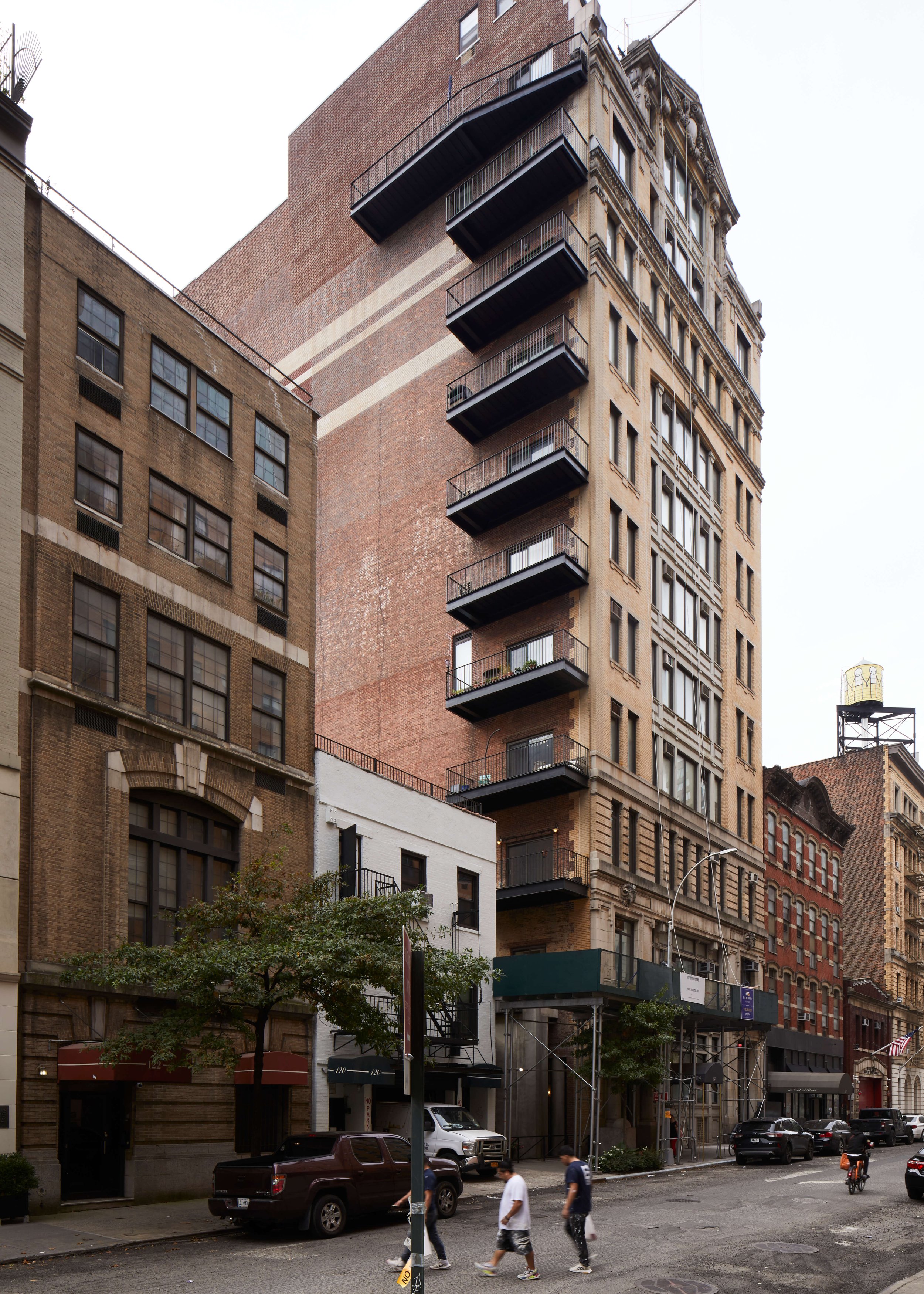  (l. to r.) 122, 120, 114-118, 112, and 106-108 East 13th Street, and 127-135 Fourth Avenue. These structures date from the late 19th through the early 20th centuries, and include commerical/industrial buildings since converted to residences, altered
