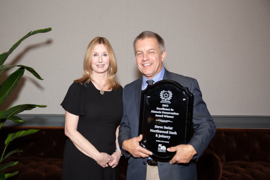 Kyle and Steve Swiat with plaque.jpg