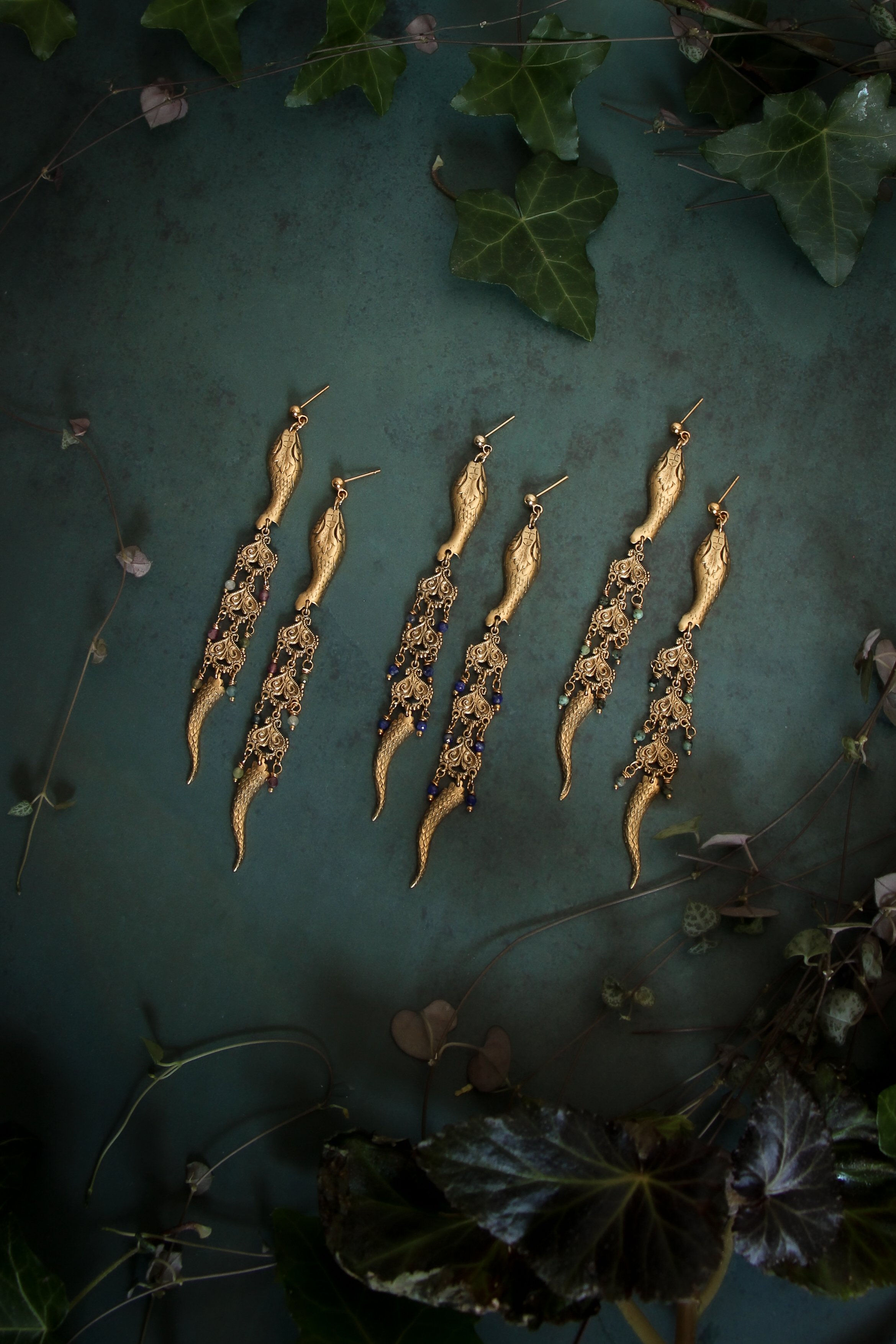 Dancing Serpent Post Earrings Product Flatlay .jpg
