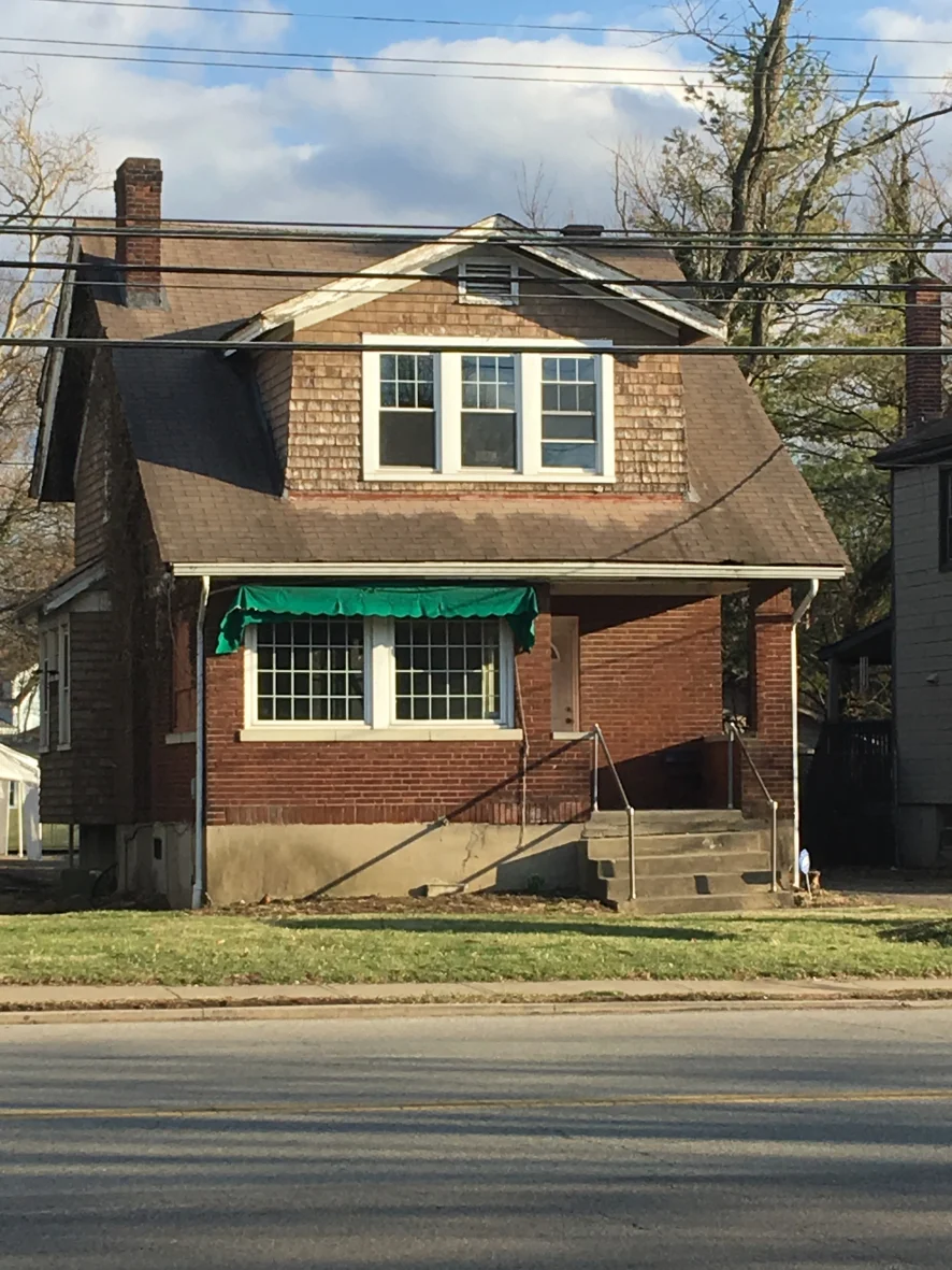 original-building-front-elevation-sun-6238.jpg
