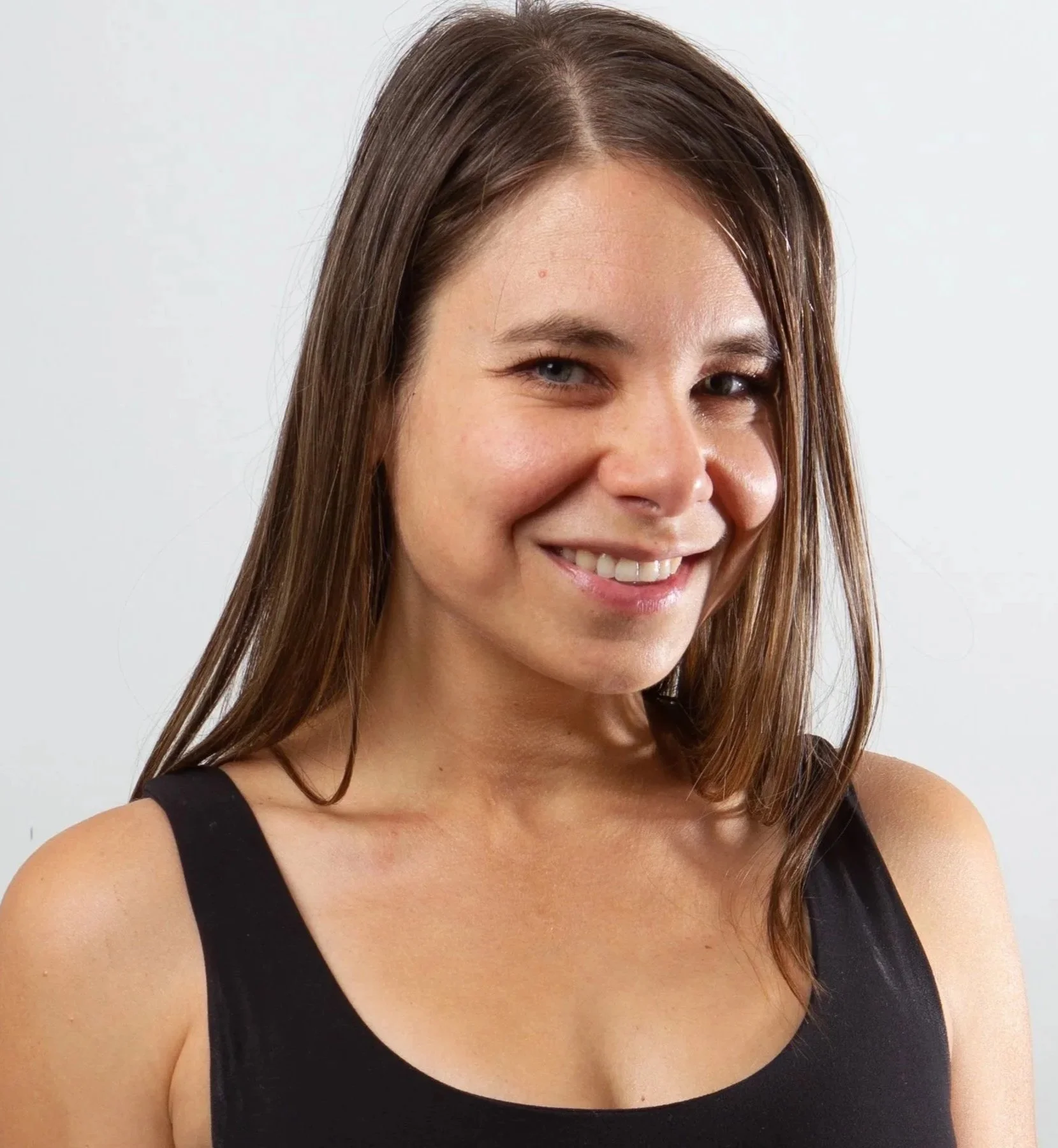 Headshot of Megan Fuller, Certified Pilates Instructor and Coach
