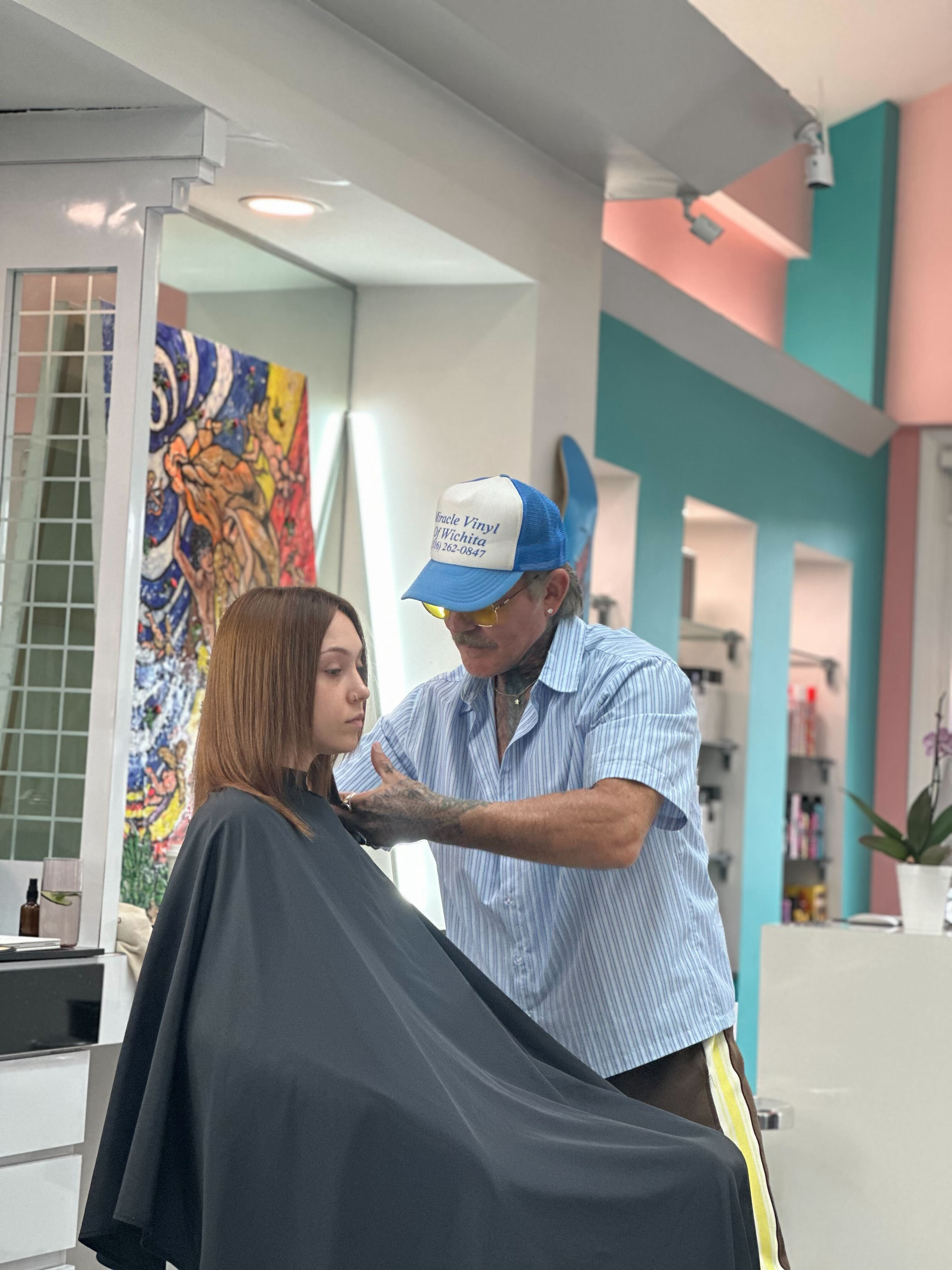 Haircut education class being performed at Bellibone Salon in Maywood, NJ.
