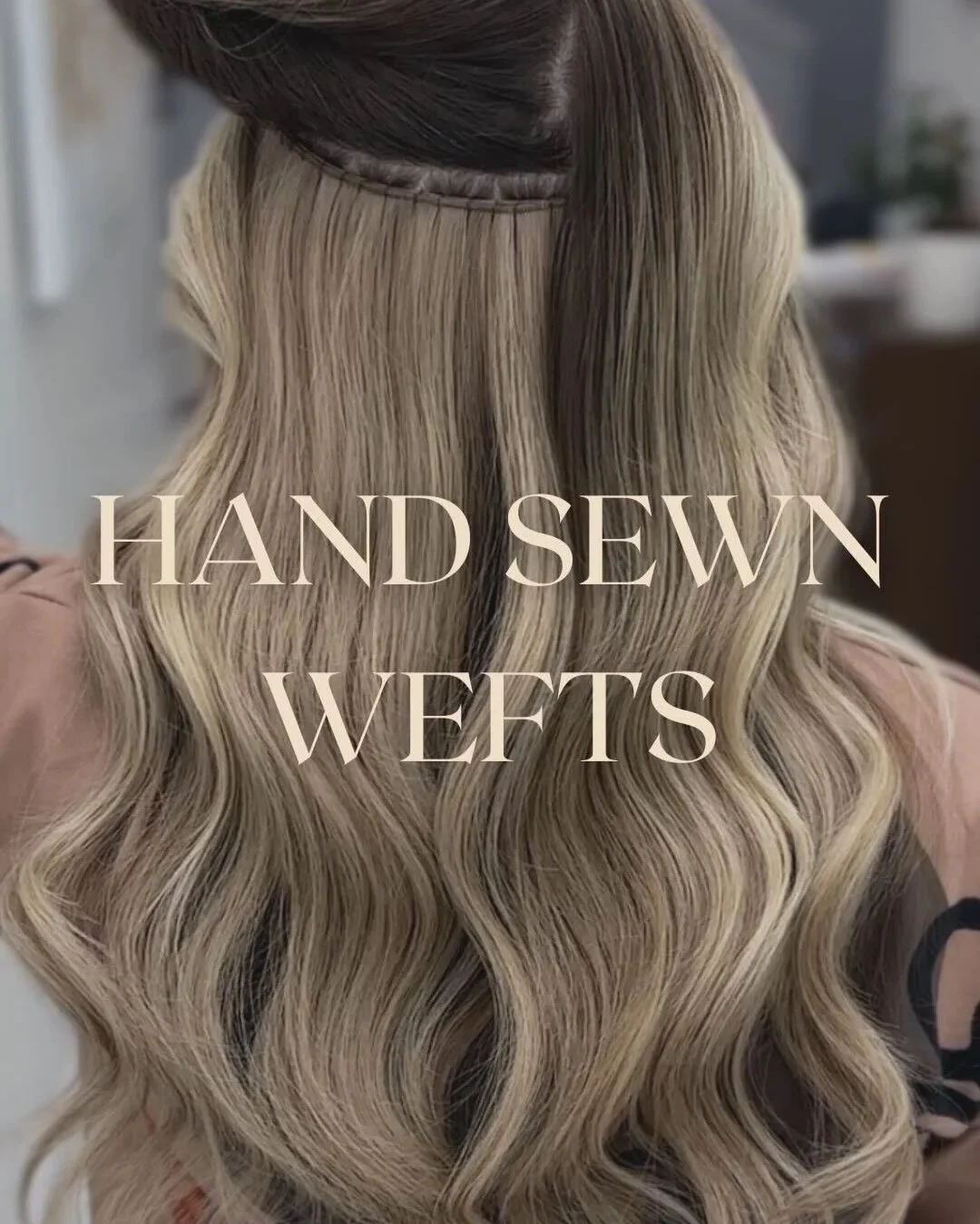 Natural-looking hair extensions installed in Maywood NJClose-up of a person's blonde, hand-sewn, WEFs (Wear Extensions Festival) hair with large, loose waves. The person is wearing a mauve-colored top