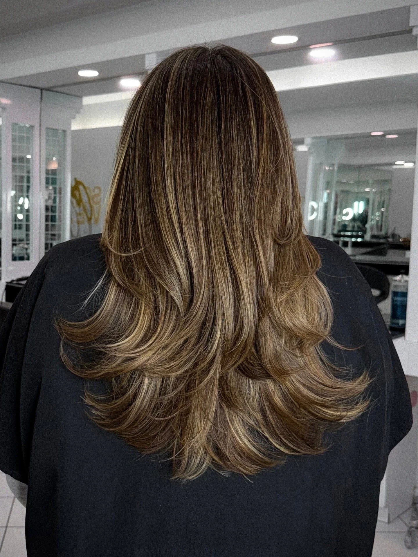 Lived-in, golden balayage performed by expert colorists at Bellibone Salon in Bergen County, NJ.