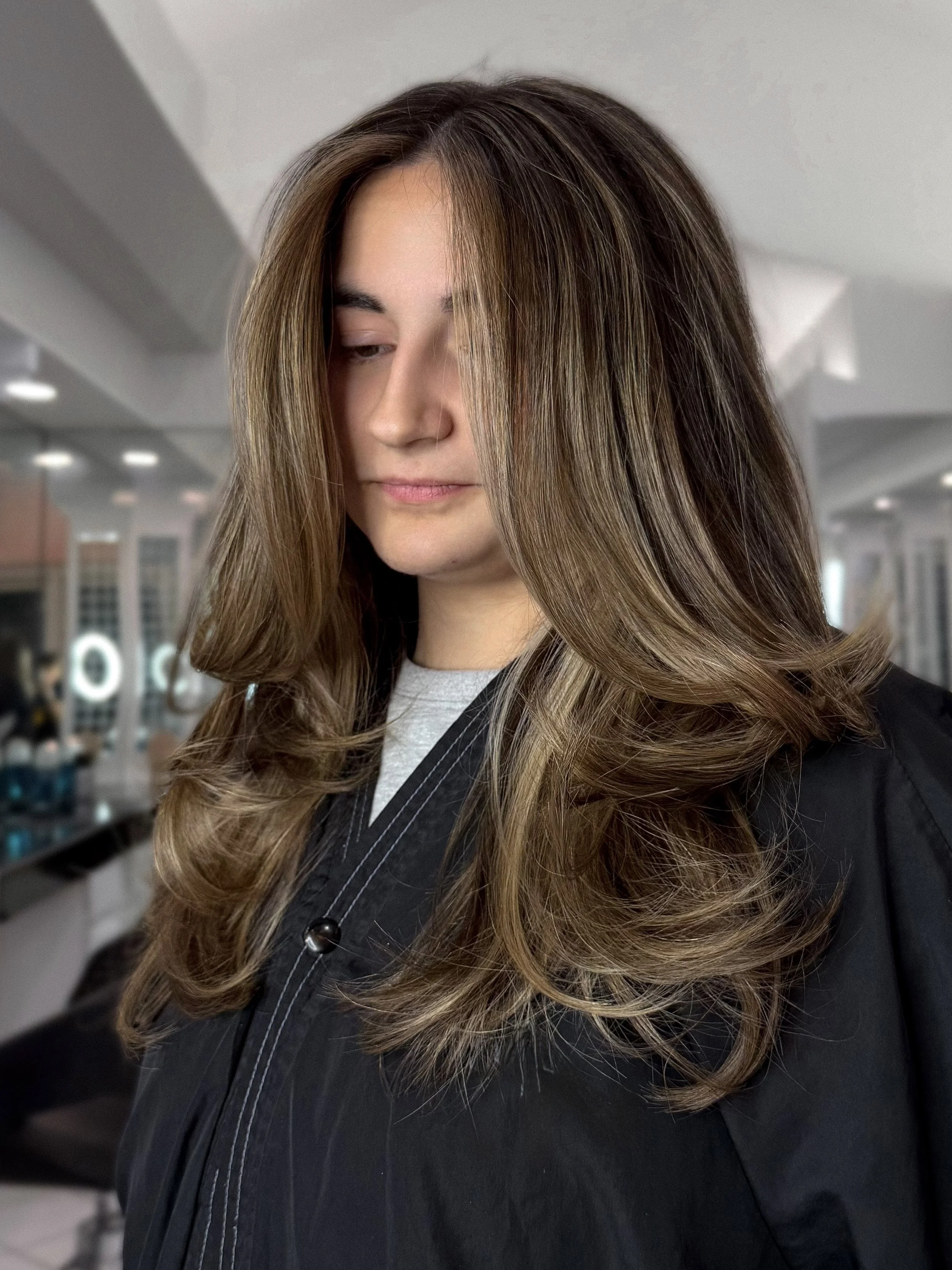 Golden balayage and lived-in color in Bergen County, NJ at Bellibone Salon.